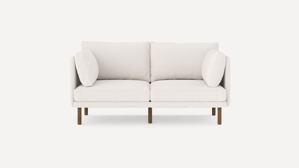 modern two - seater sofa with light beige upholstery and wooden legs, featuring a clean, minimalist design