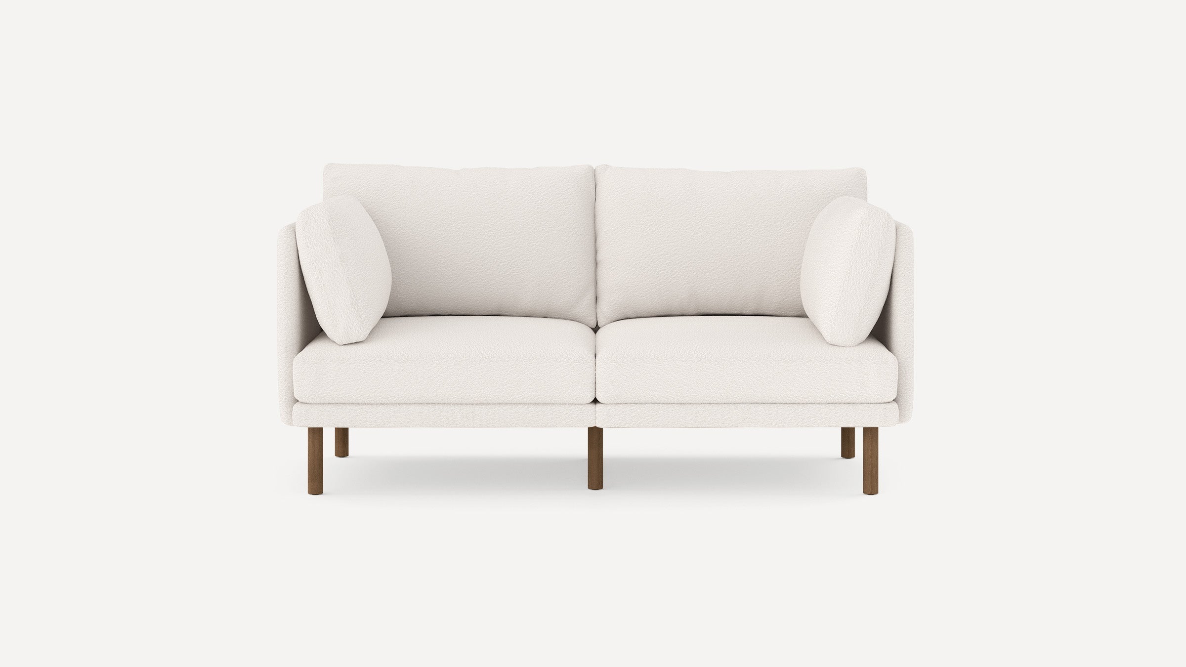 modern two - seater sofa with light beige upholstery and wooden legs, featuring a clean, minimalist design