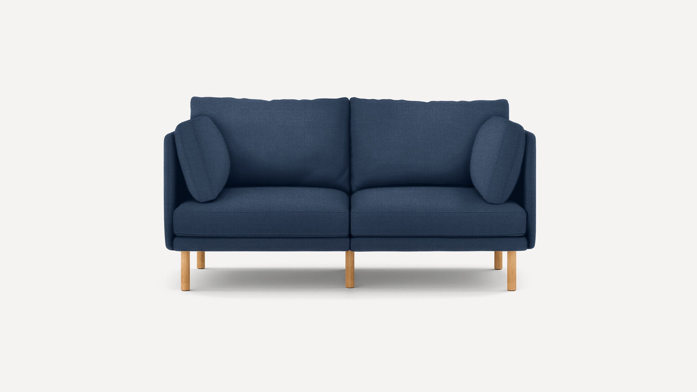 modern navy blue fabric loveseat with wooden legs and clean lines on the back, featuring a clean, minimalist design