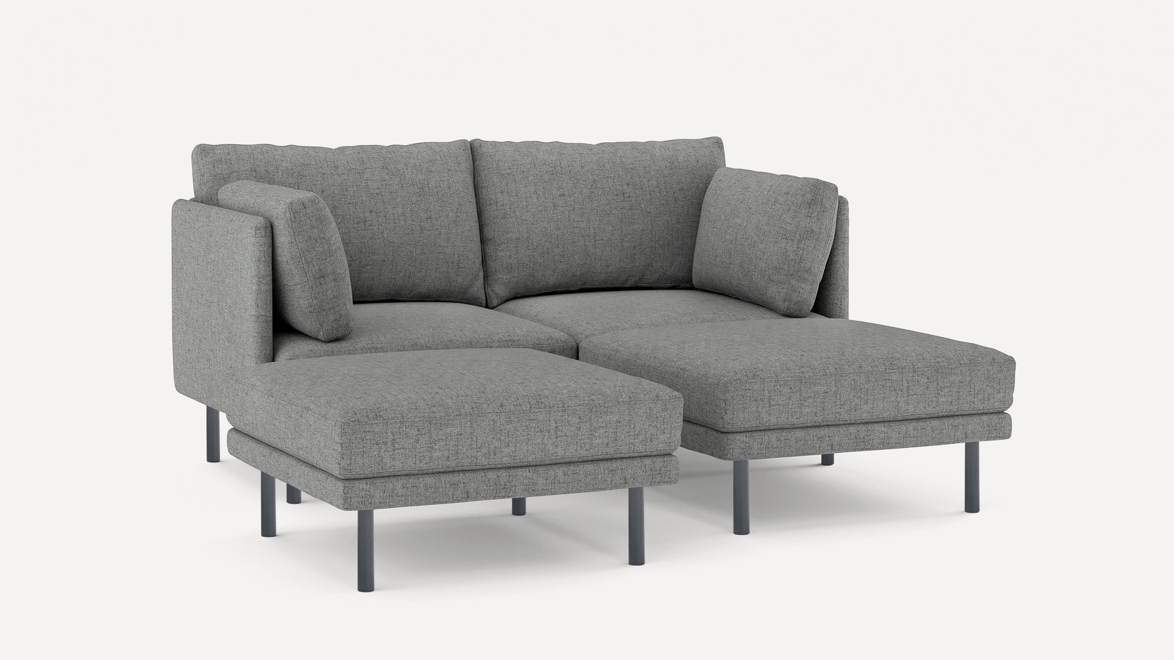 Modern gray fabric sectional sofa with clean lines, metal legs, and plush cushions, featuring a chaise lounge on the right side.