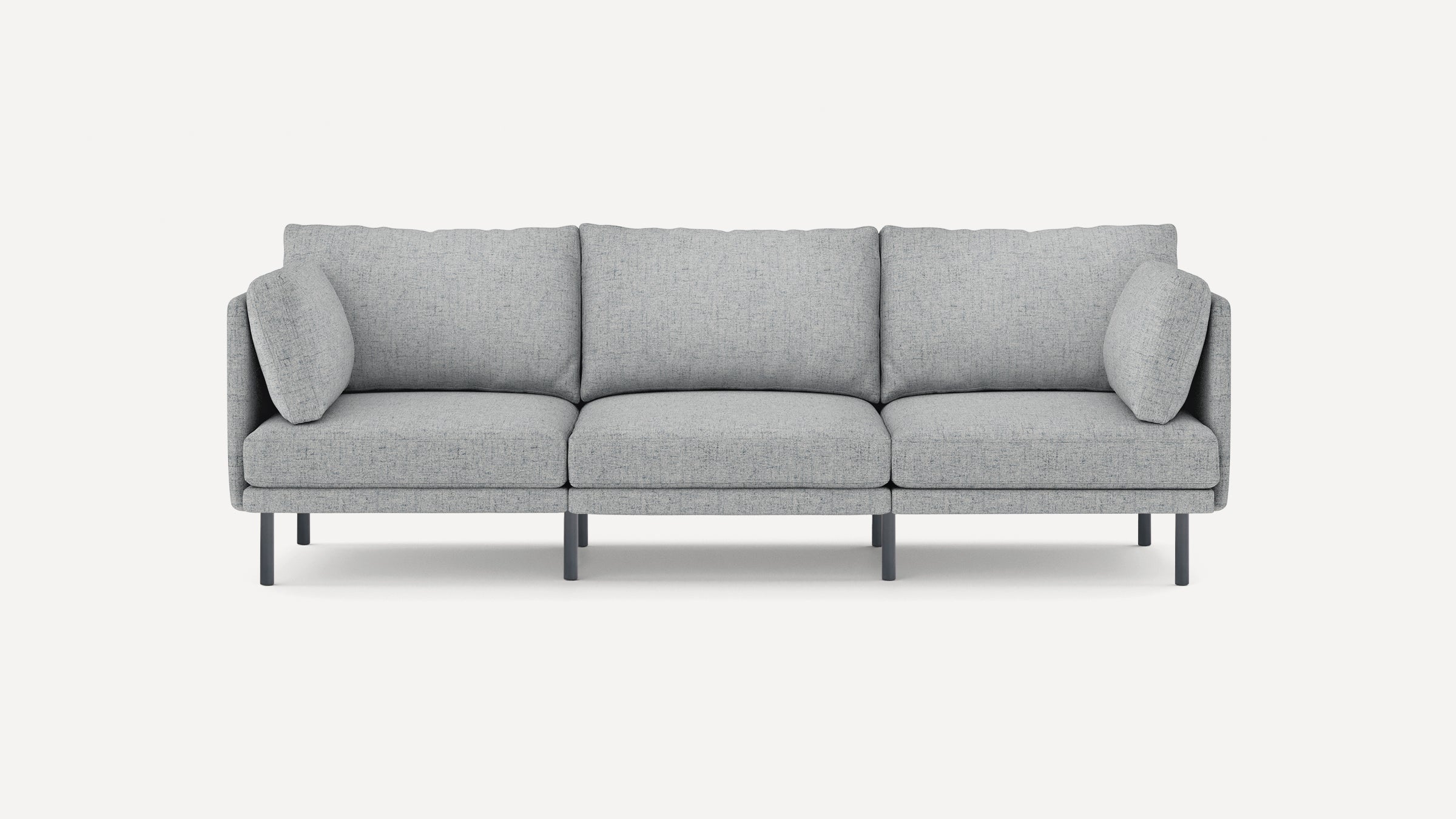 Modern three-seater gray fabric sofa with slim black metal legs and cushioned armrests, shown on a white background.