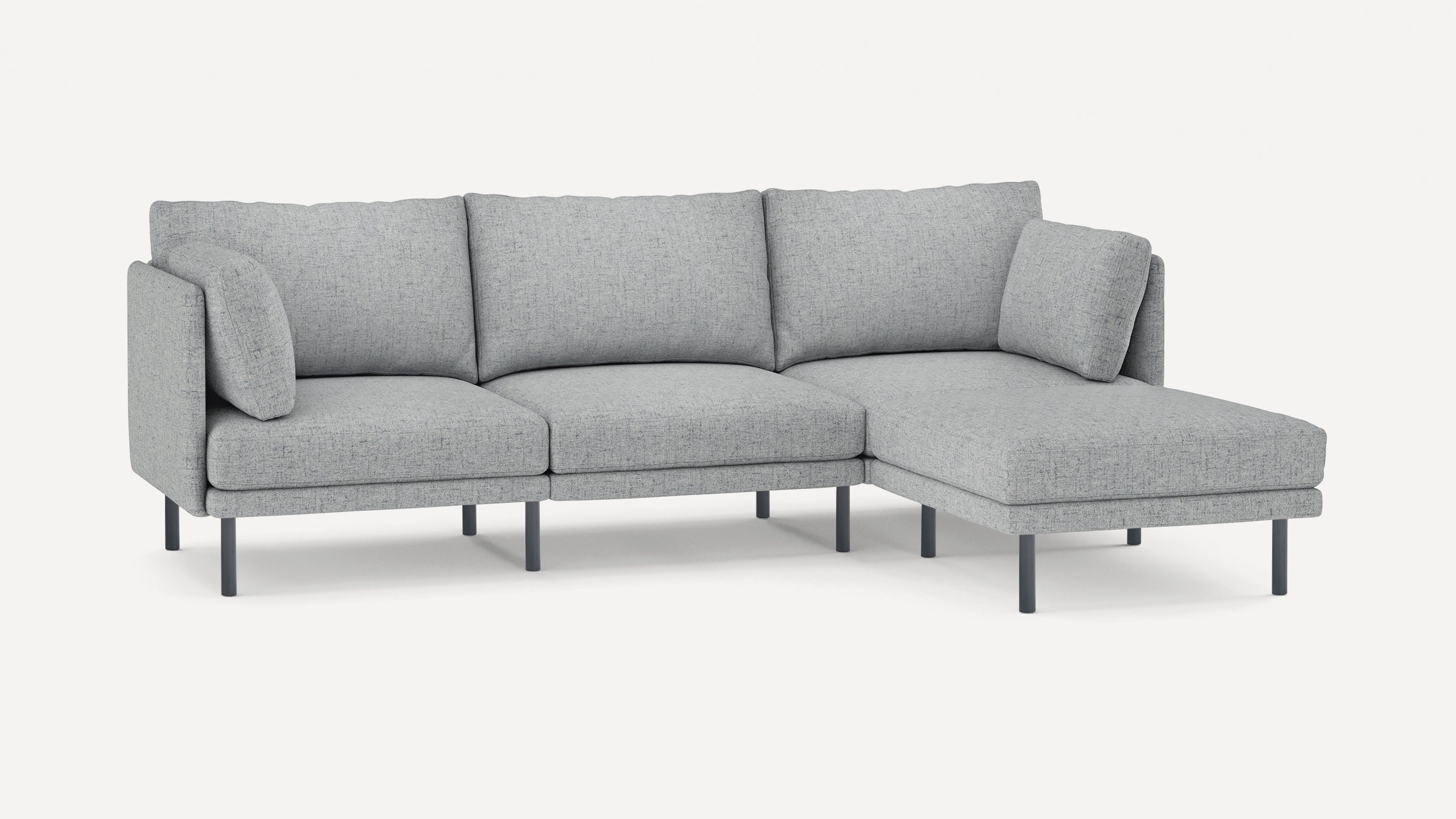 Modern light gray fabric L-shaped sectional sofa with slim black metal legs and removable cushions.
