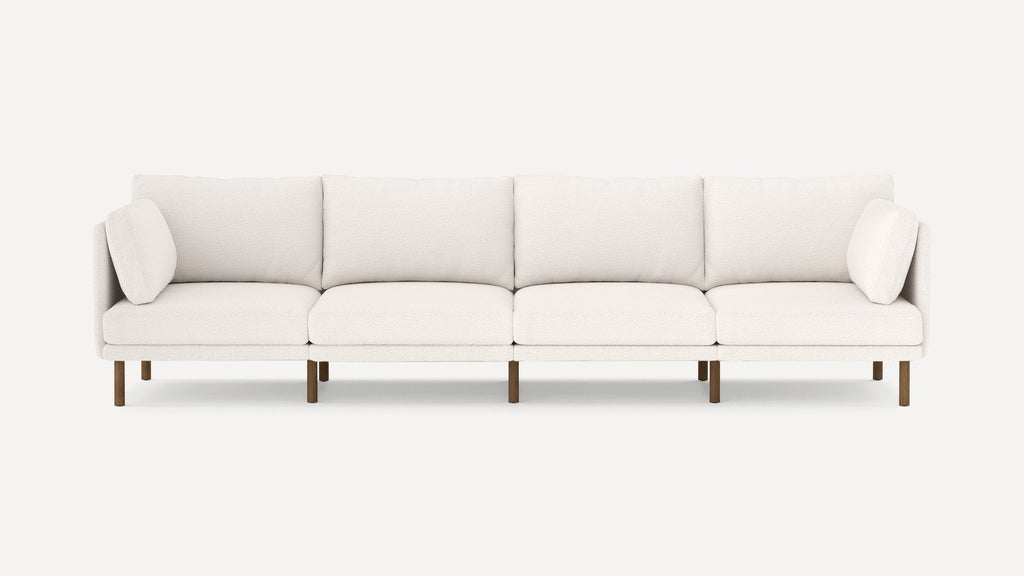 modern l - shaped sectional sofa with clean lines and wooden legs, designed for comfort and minimalism
