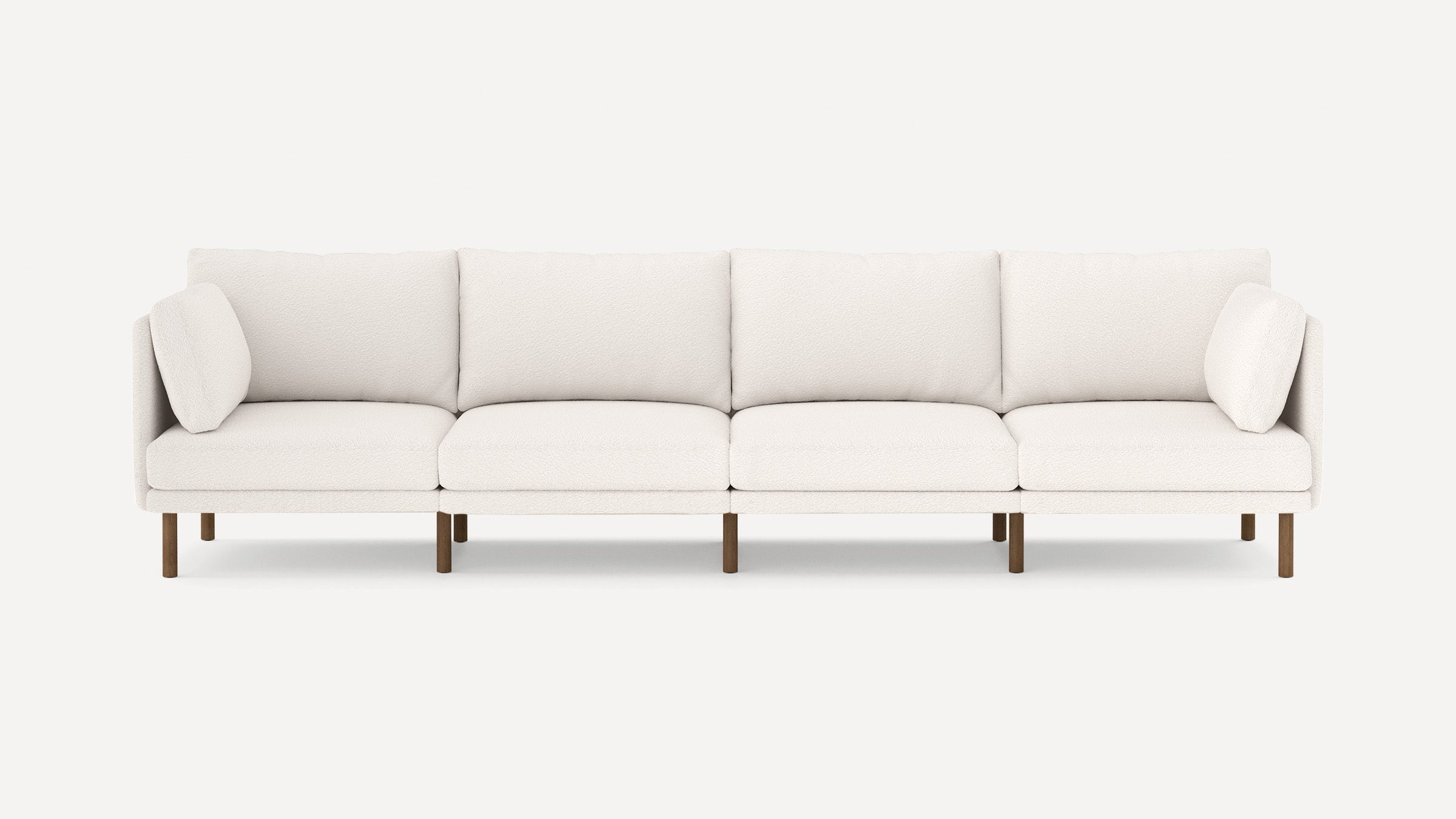 modern l - shaped sectional sofa with clean lines and wooden legs, designed for comfort and minimalism