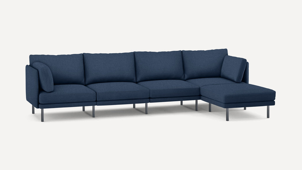 Modern navy blue sectional sofa with clean lines, metal legs, and removable cushions for versatile seating and comfort.
