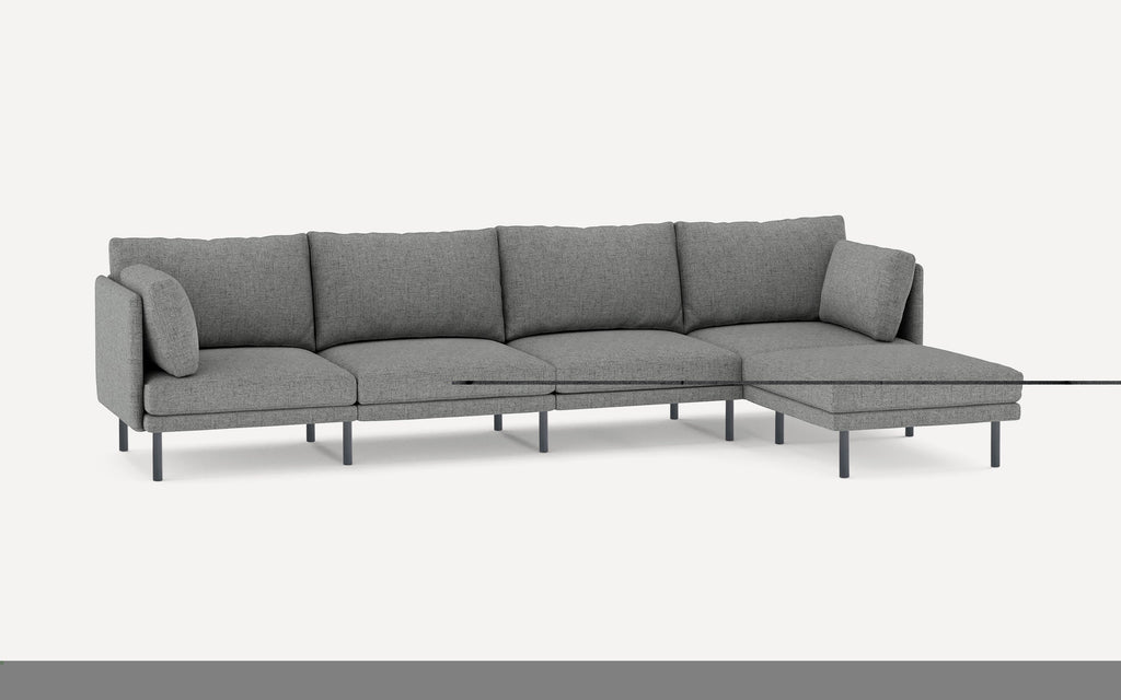 Modern gray fabric sectional sofa with metal legs, featuring a chaise lounge on the right and plush back cushions for comfort.