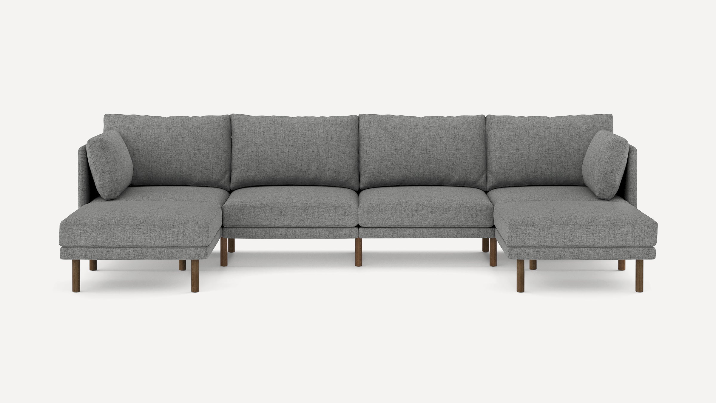 Modern gray fabric sectional sofa with wooden legs, featuring two chaise lounges on each end and cushioned backrests.