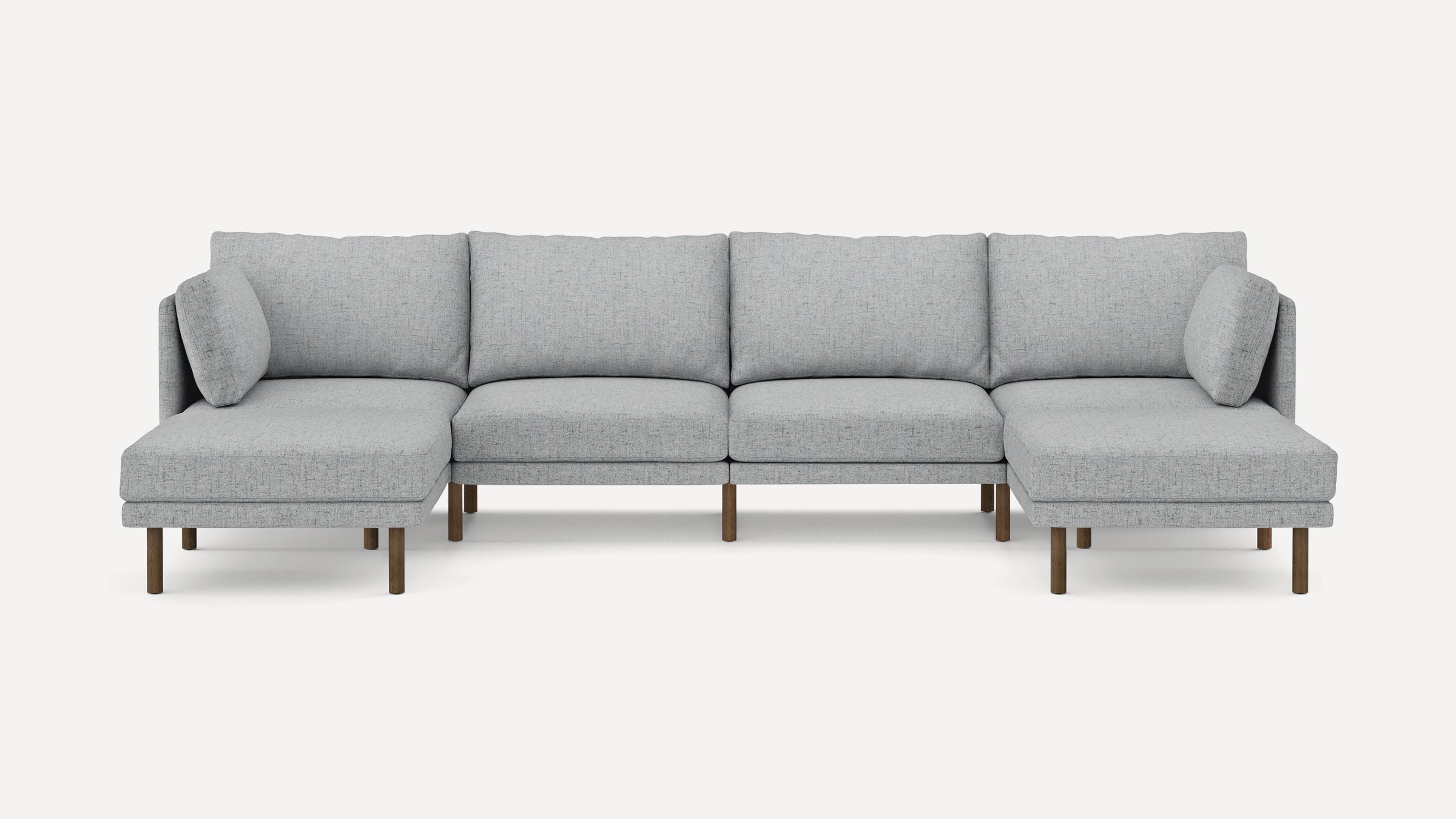 Light gray modern sectional sofa with wooden legs, featuring two chaise lounges on each end and plush back cushions.