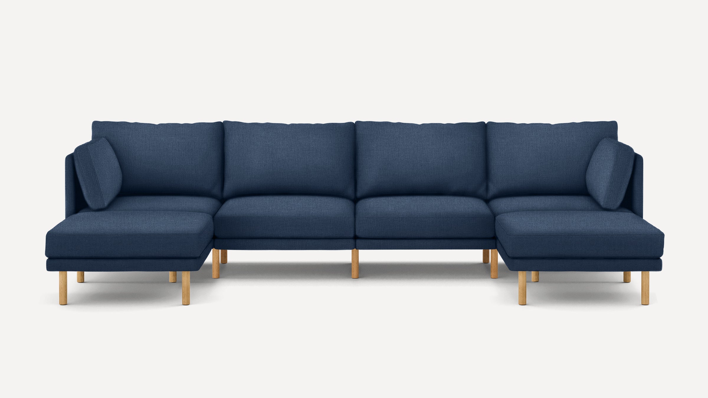 Modern navy blue sectional sofa with wooden legs, featuring cushioned seats and backrests, arranged in a U-shape with corner and loveseat sections.