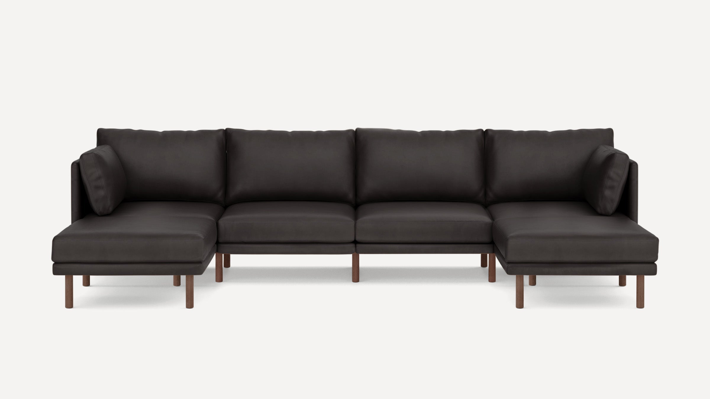 Modern dark brown sectional sofa with chaise lounges on both ends and wooden legs.