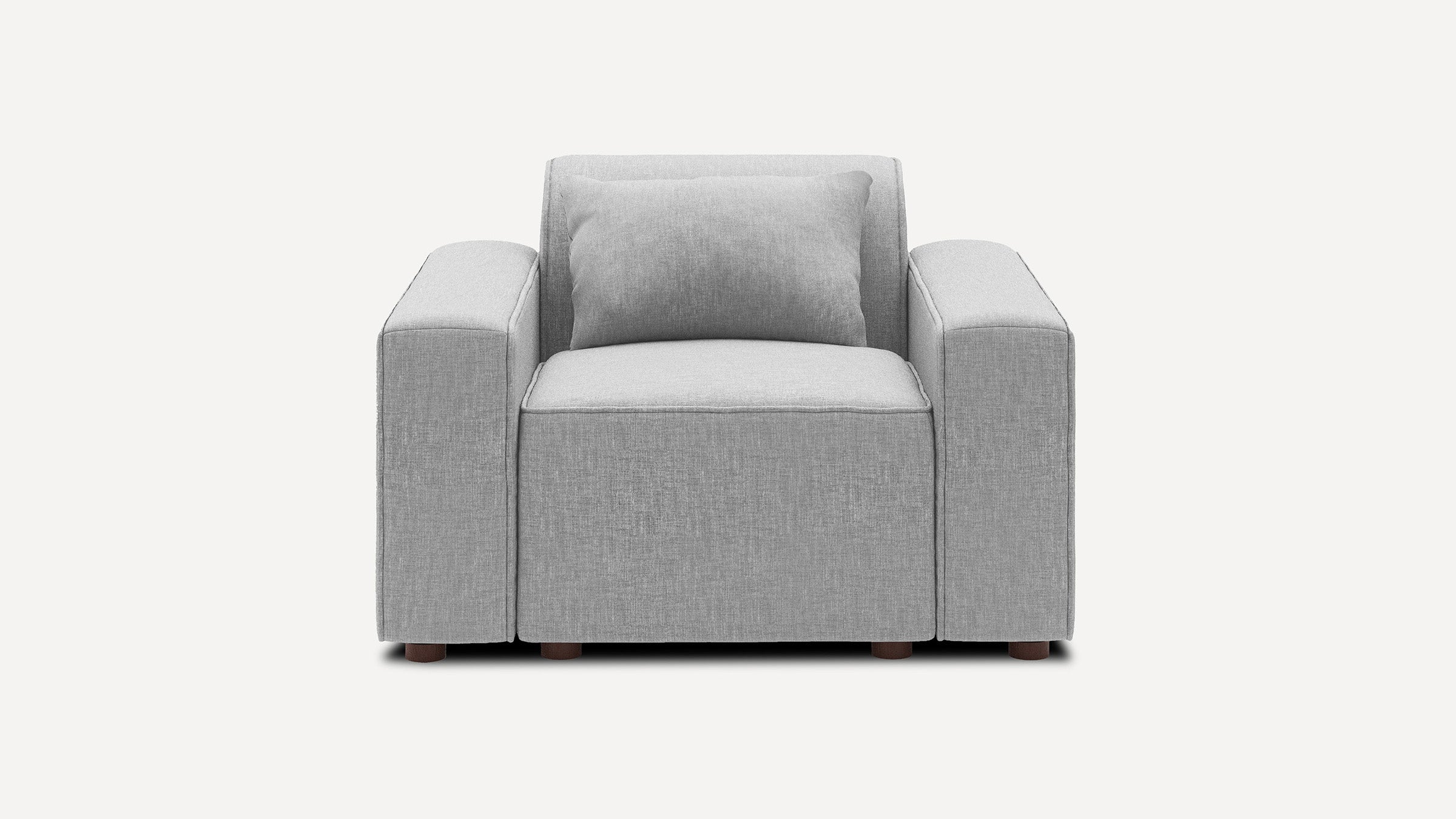 Modern grey fabric armchair with wide armrests and a matching rectangular cushion, shown against a plain white background.