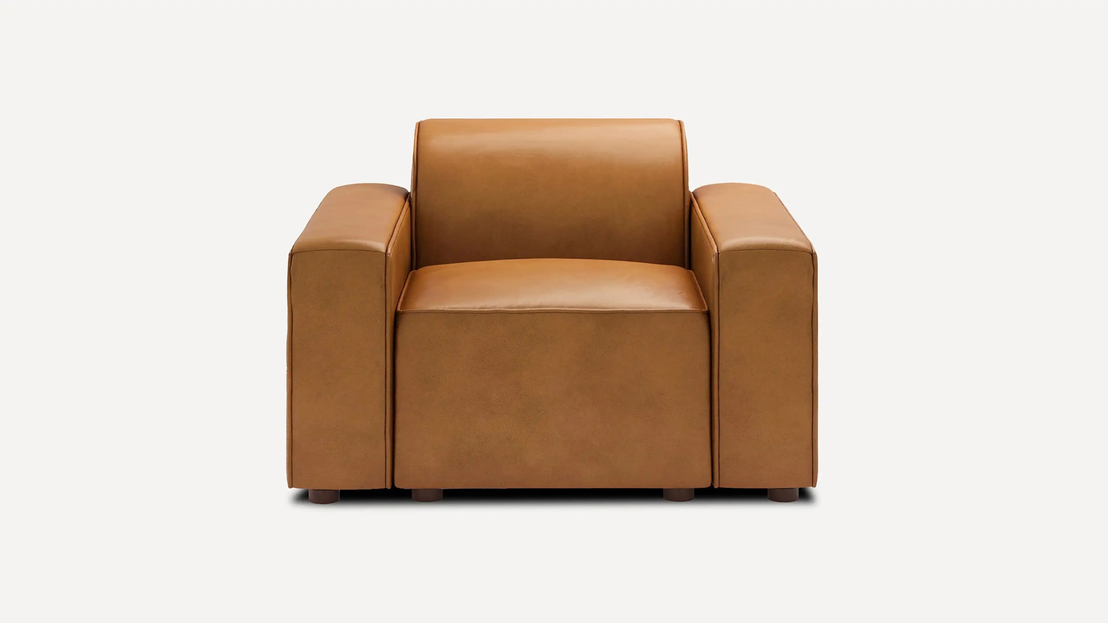 modern tan leather armchair with wooden legs and backrests, featuring a square shaped cushioned seat and backrest