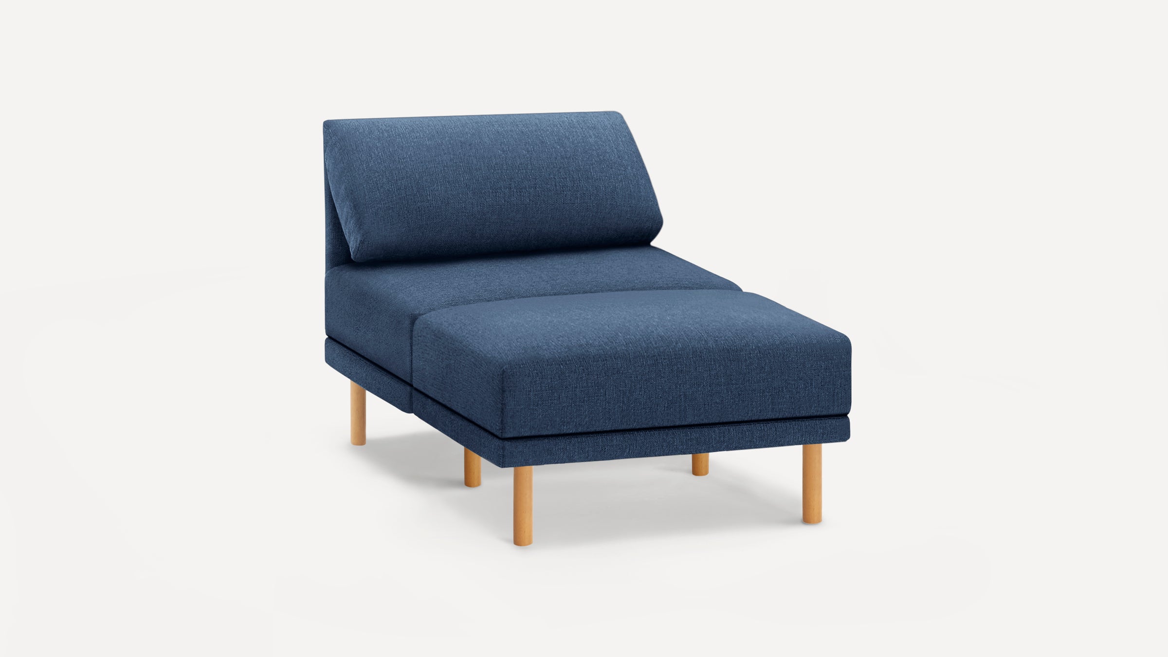 Modern chaise lounge chair in dark blue fabric with cylindrical wooden legs, featuring a cushioned backrest and seat.