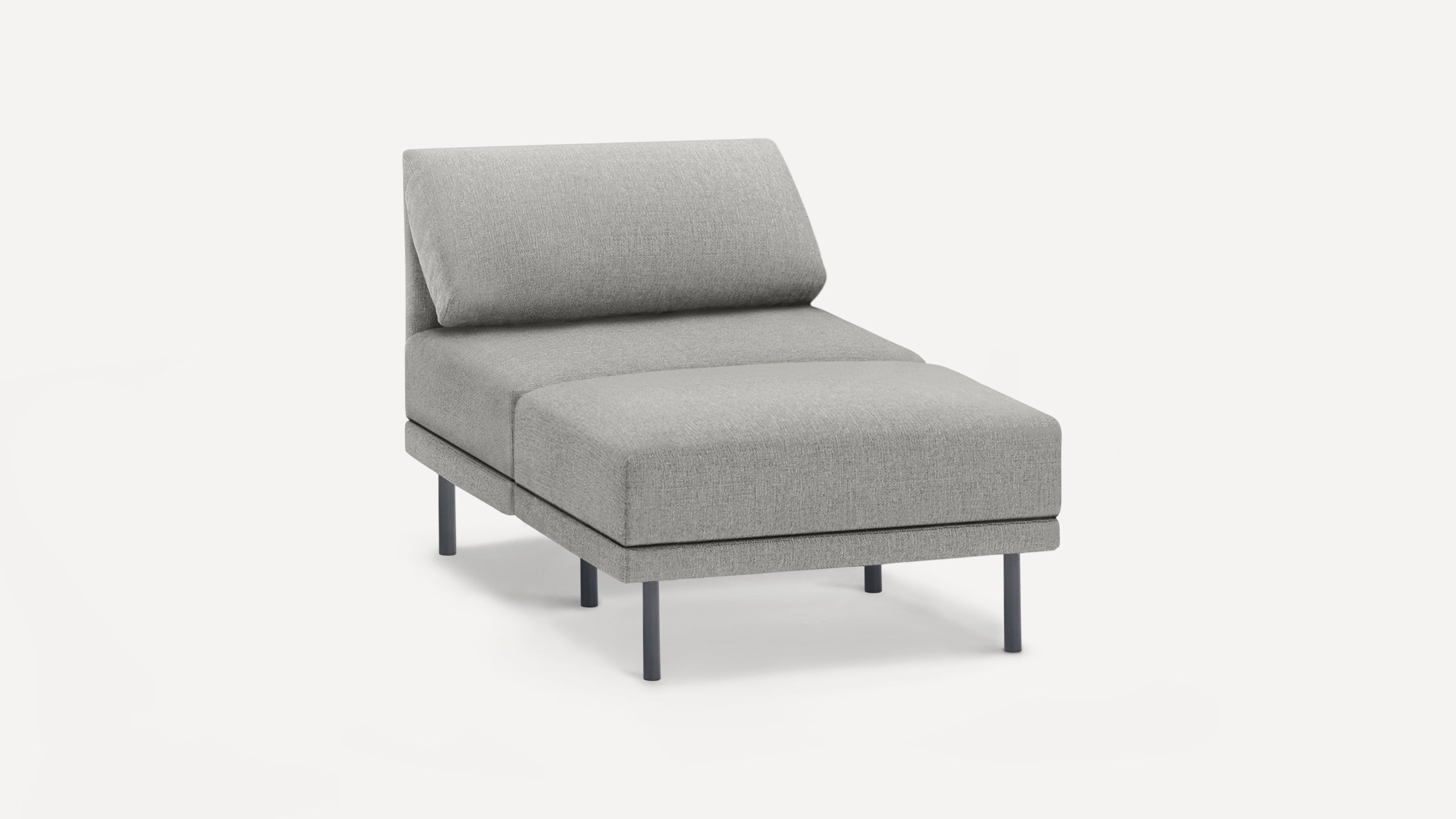 Modern grey upholstered chaise lounge with cushioned backrest and metal legs on white background.