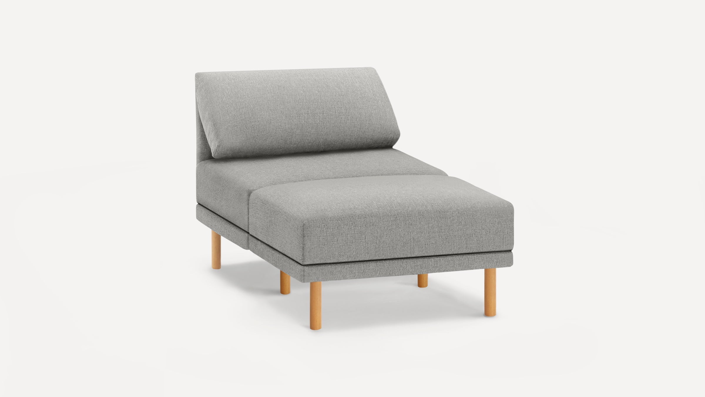 Modern light gray chaise lounge with wooden legs, plush cushioned seat, and angled backrest for comfortable reclining.