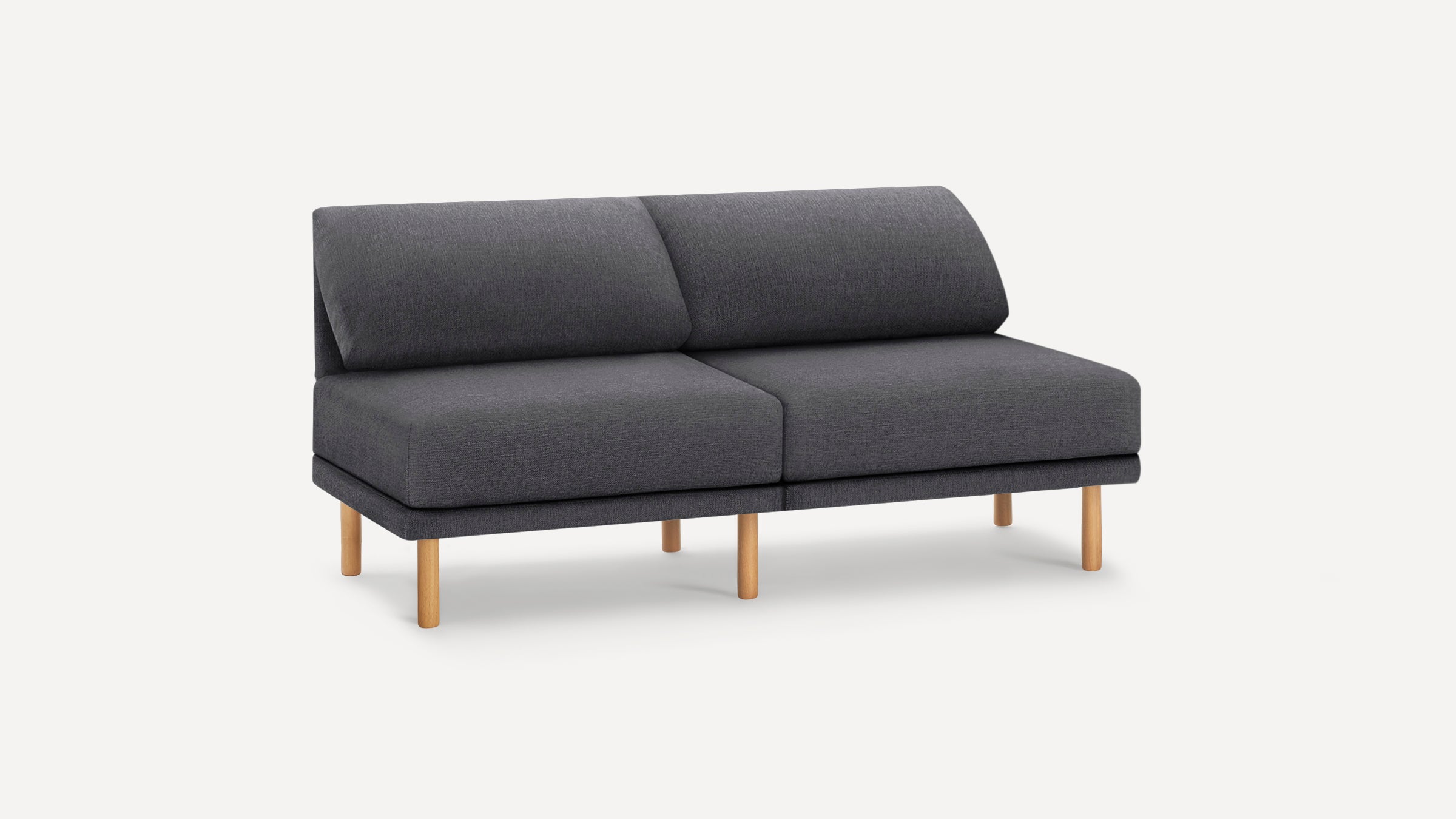 Modern two-seater sofa with dark gray fabric upholstery and light wooden legs, minimalist design on white background.