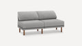 Modern grey two-seater sofa with soft cushions and wooden legs, sleek minimalist design, light fabric upholstery.
