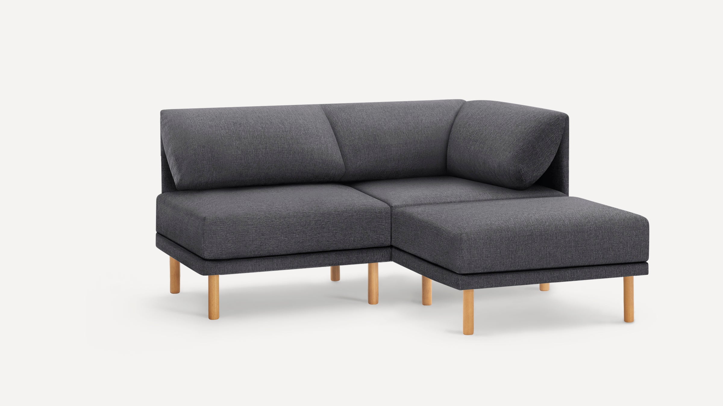 Modern dark gray fabric sectional sofa with wooden legs, featuring a right chaise lounge and cushioned backrests.