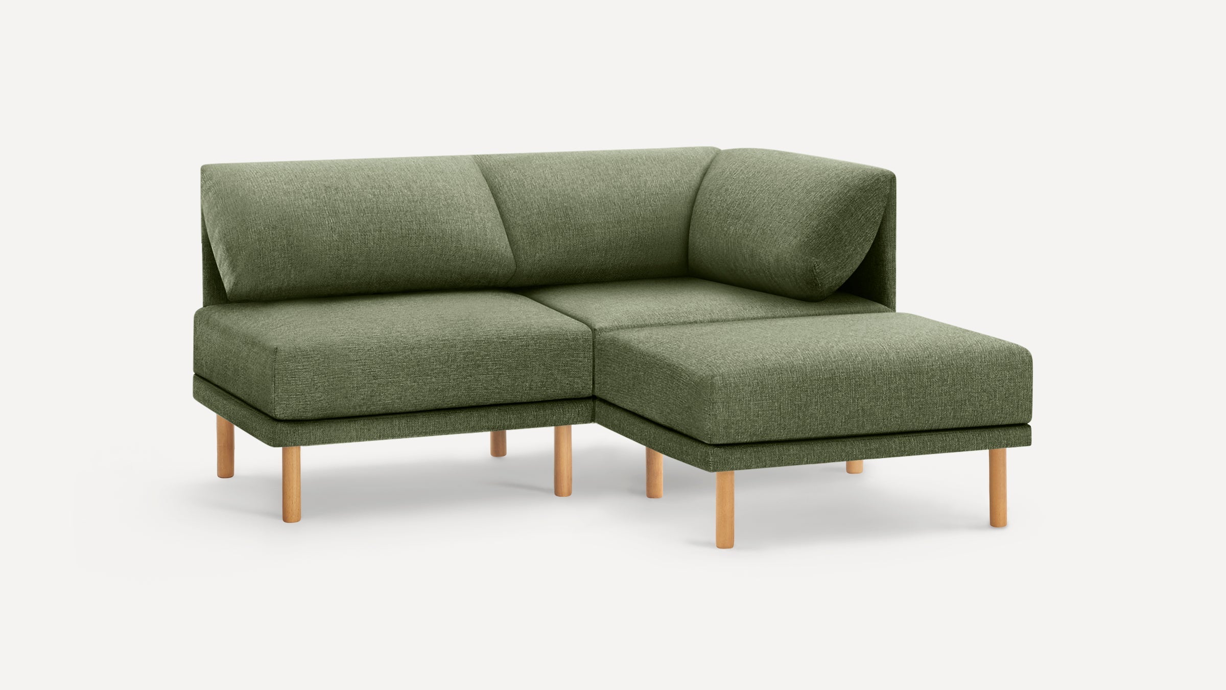 Modern L-shaped green fabric sectional sofa with wooden legs, featuring cushioned seats and backrests on a white background.