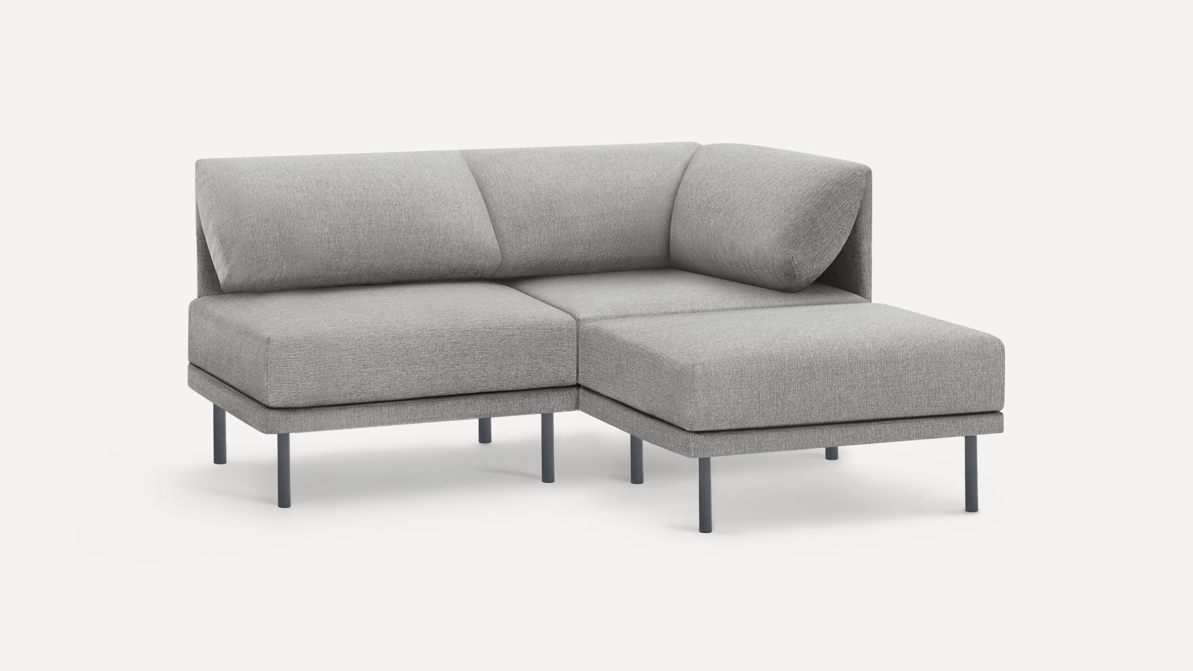 Modern gray fabric sectional sofa with metal legs, featuring clean lines and plush cushions, ideal for contemporary living spaces.