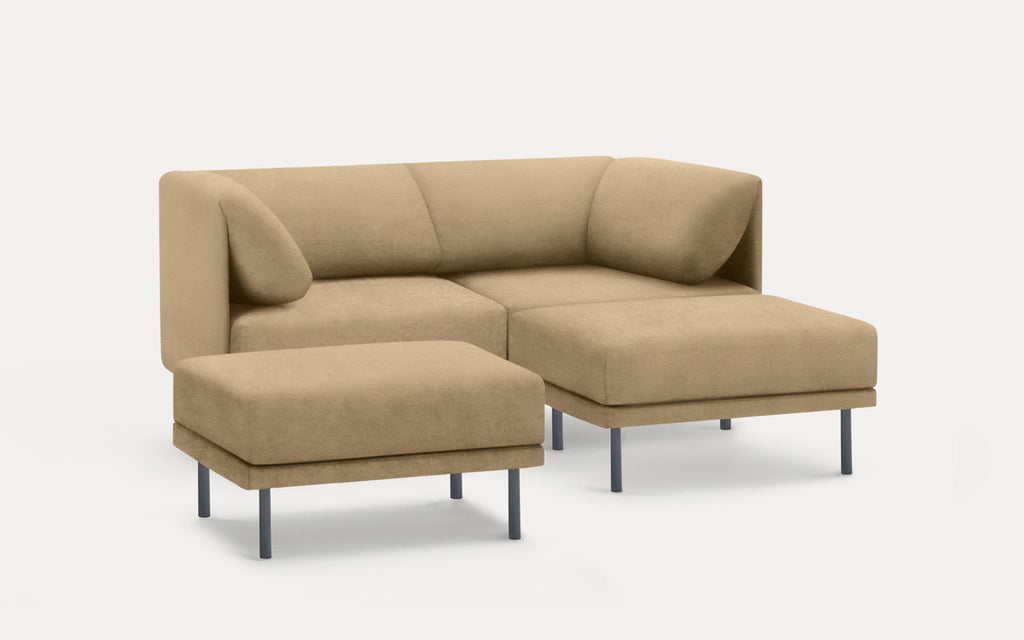 Beige modern sectional sofa with metal legs and matching ottoman, featuring soft cushions and a minimalist design.