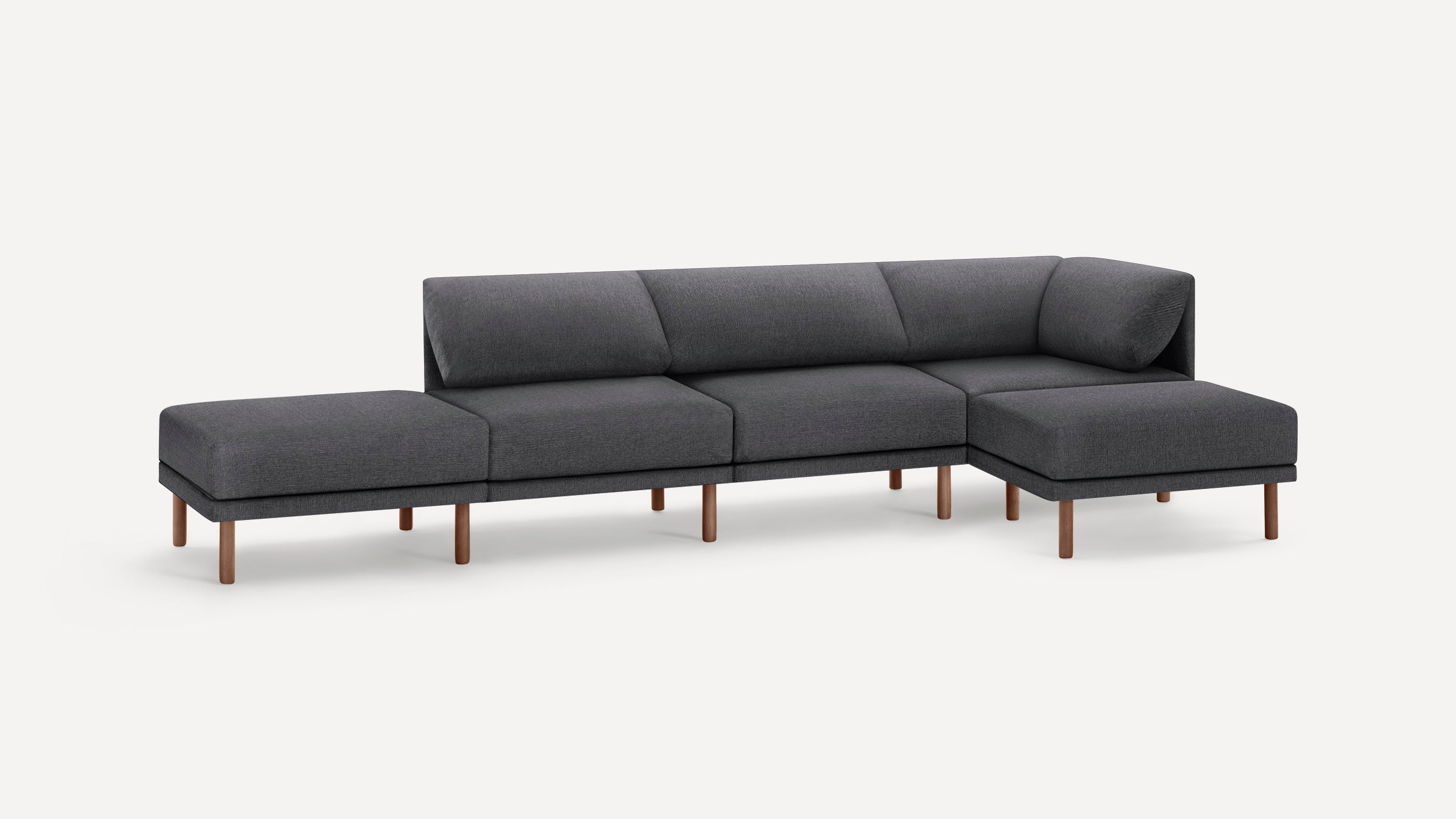 Modern L-shaped sectional sofa with dark gray upholstery and wooden legs on a white background.