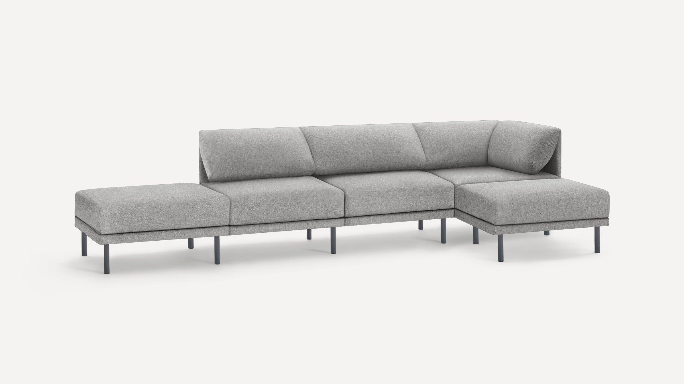 Modern light gray sectional sofa with metal legs, featuring a chaise lounge on the right side and cushioned backrests.