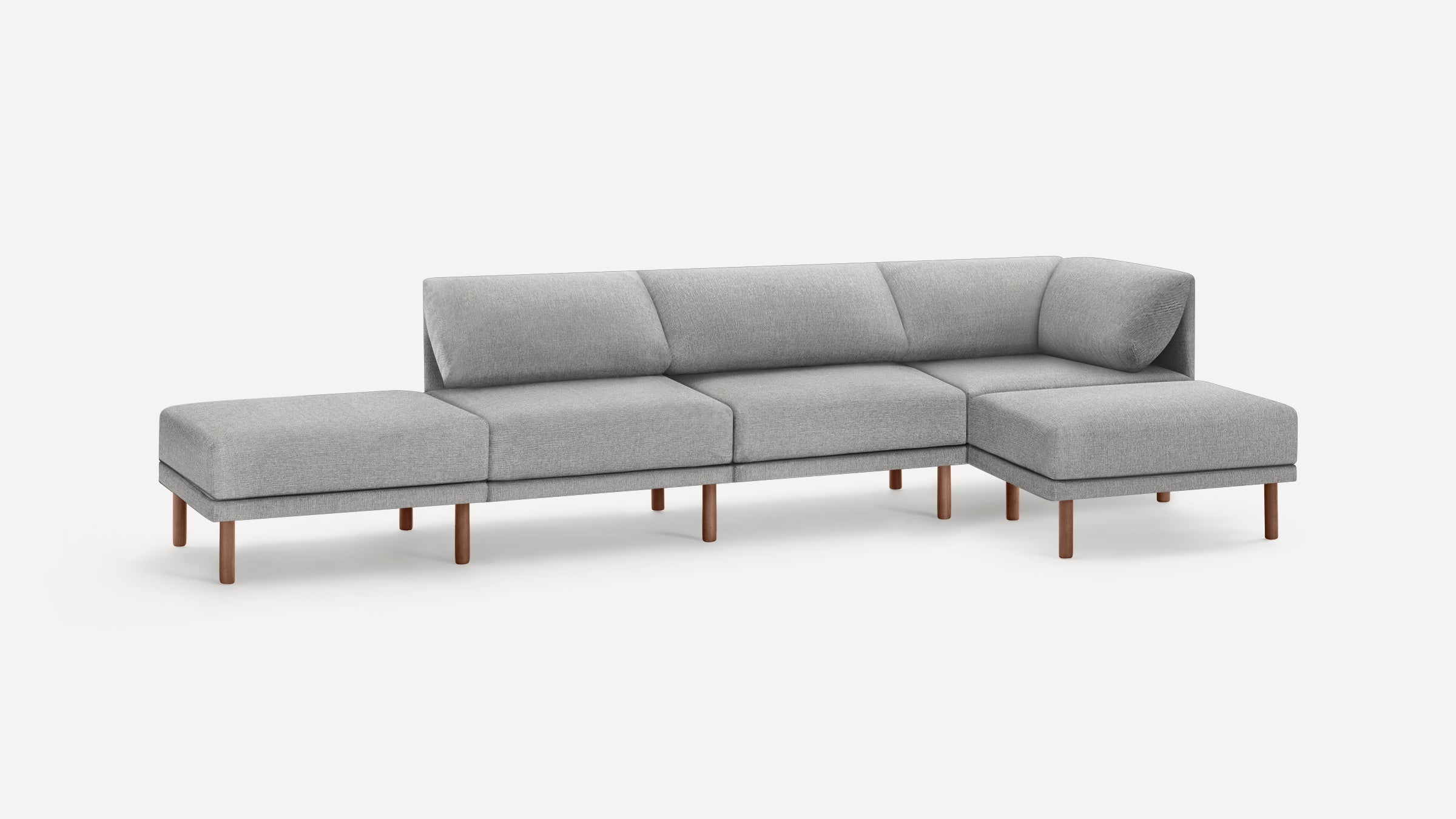 Modern gray fabric sectional sofa with wooden legs, featuring clean lines and plush cushions for comfortable seating.