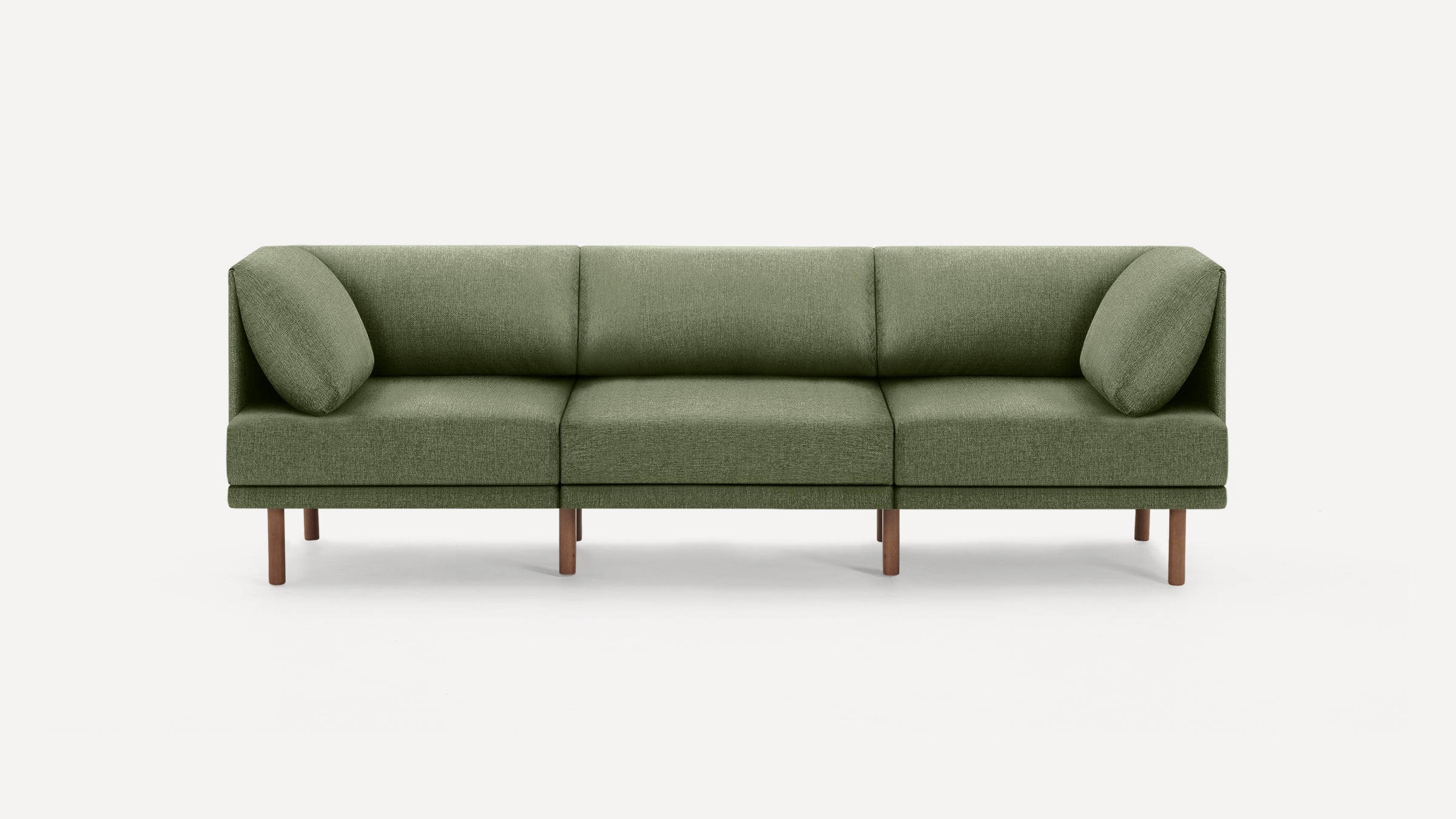 Modern three-seater sofa with olive green fabric upholstery and wooden legs, featuring two matching side cushions.