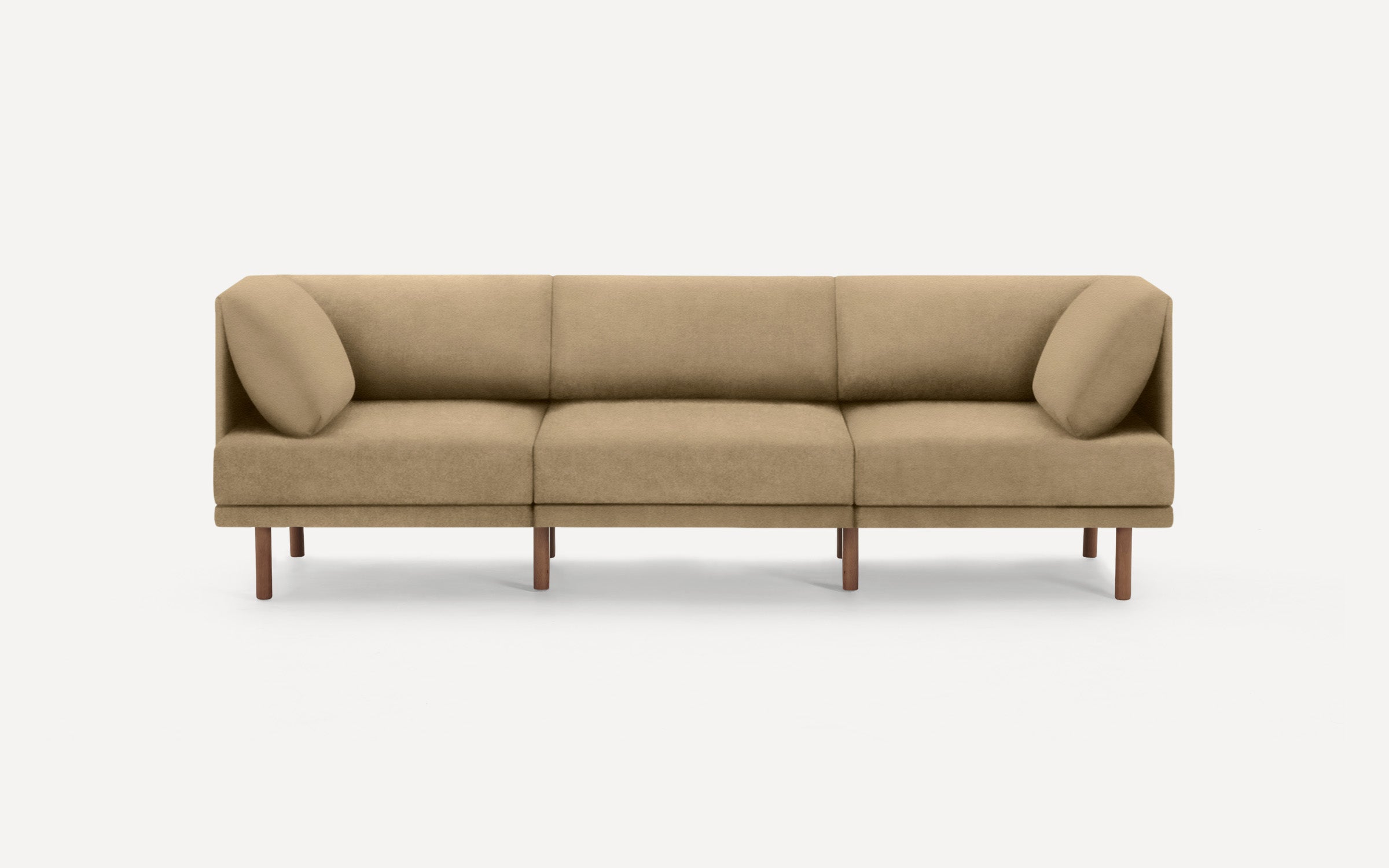 modern beige fabric sofa with wooden legs and clean lines on a white background