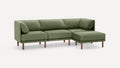 Modern sectional sofa with green fabric upholstery, wooden legs, and cushioned backrest and armrests on both ends.