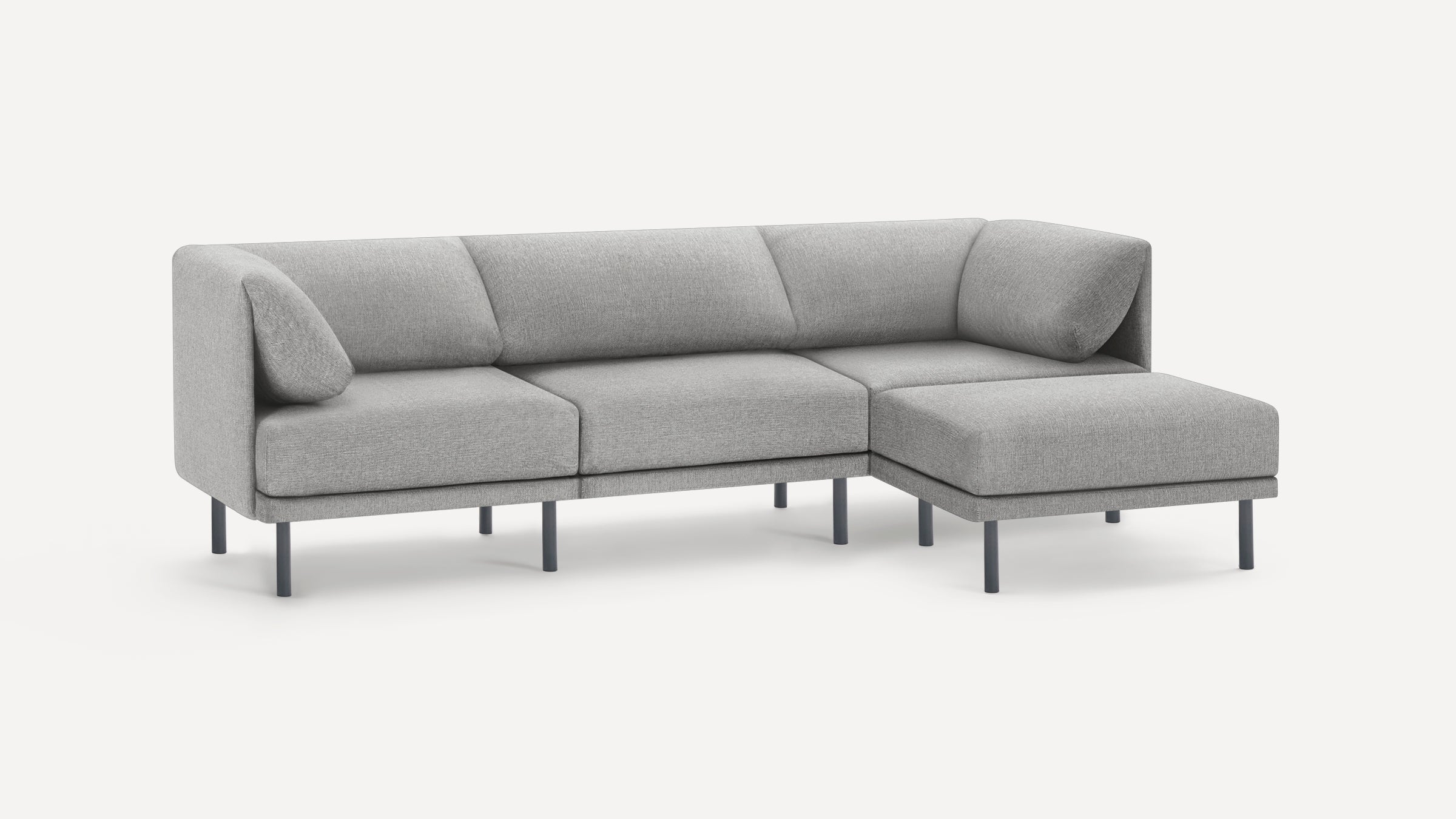 Modern light gray fabric sectional sofa with clean lines, metal legs, and a chaise lounge on the right side.