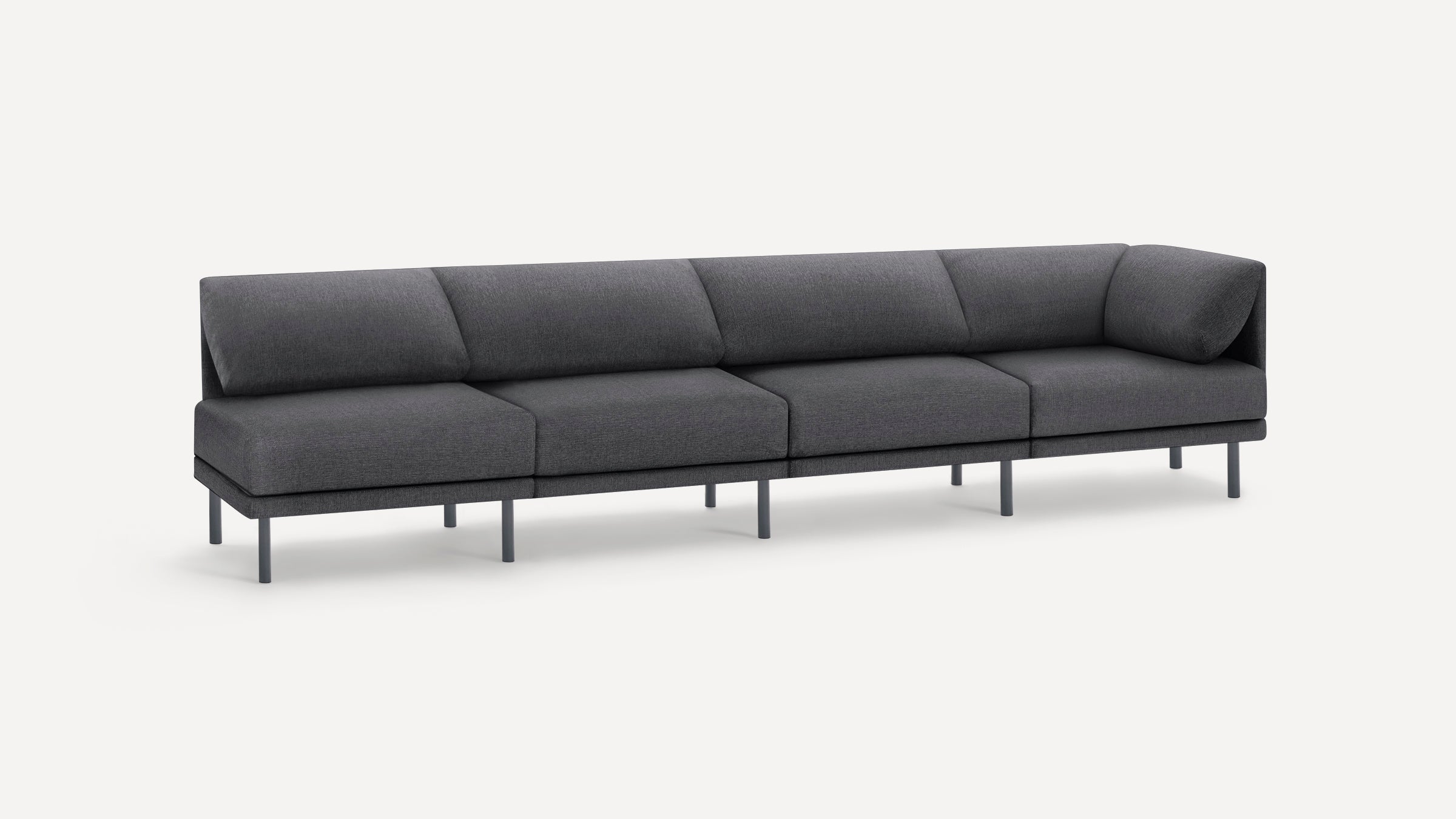 Modern dark gray fabric sectional sofa with five seat cushions and metal legs, minimalist design on white background.