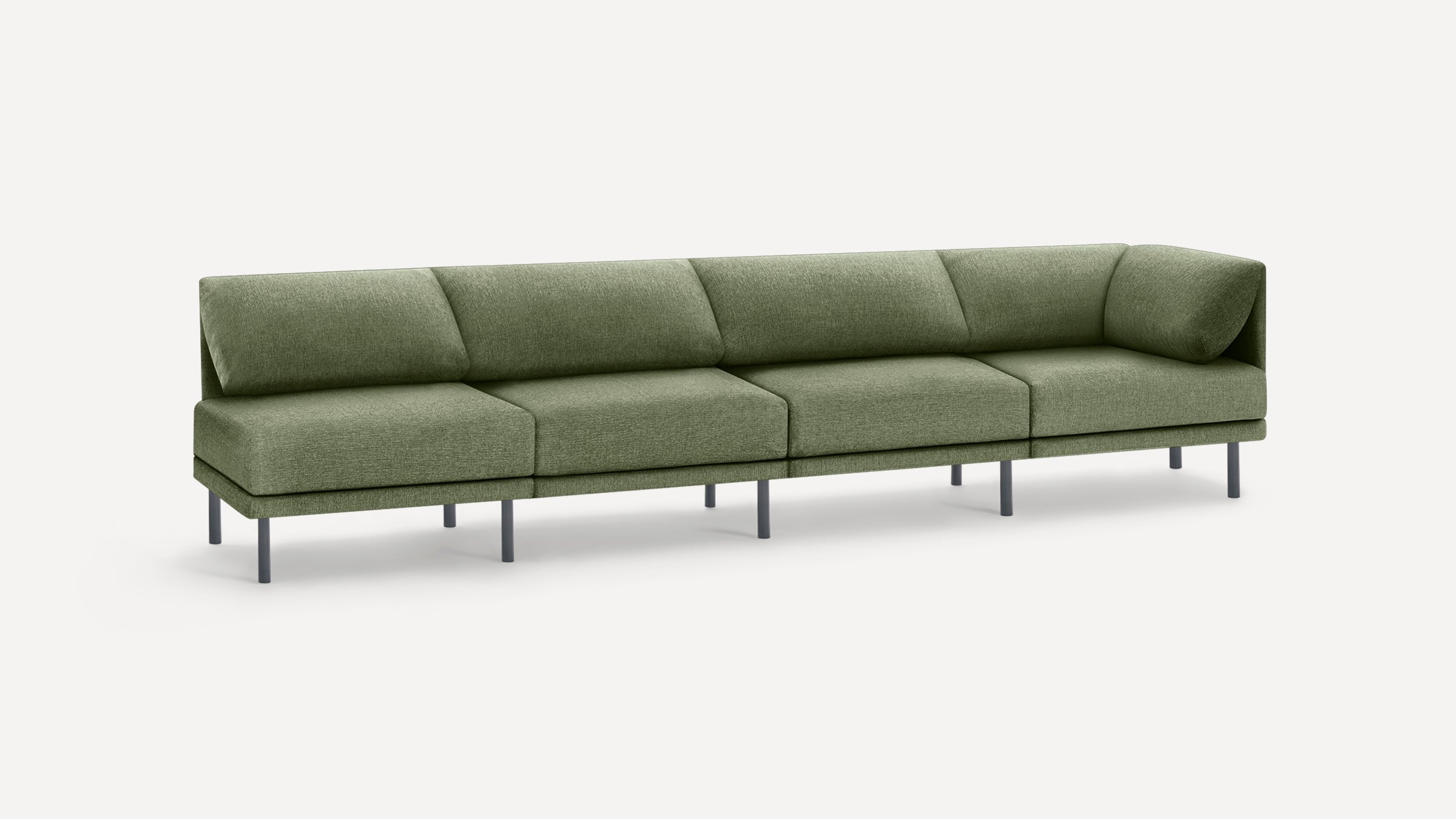 Long modern sectional sofa in muted green upholstery with square cushions and slim black metal legs on white background.