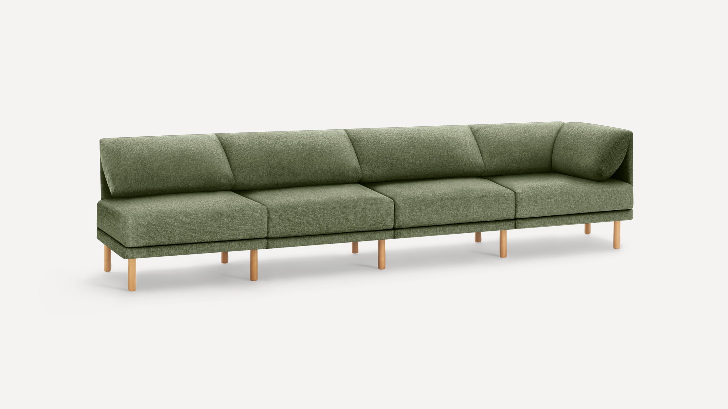 Modern olive green sectional sofa with angled back cushions and light wooden legs on a plain white background.