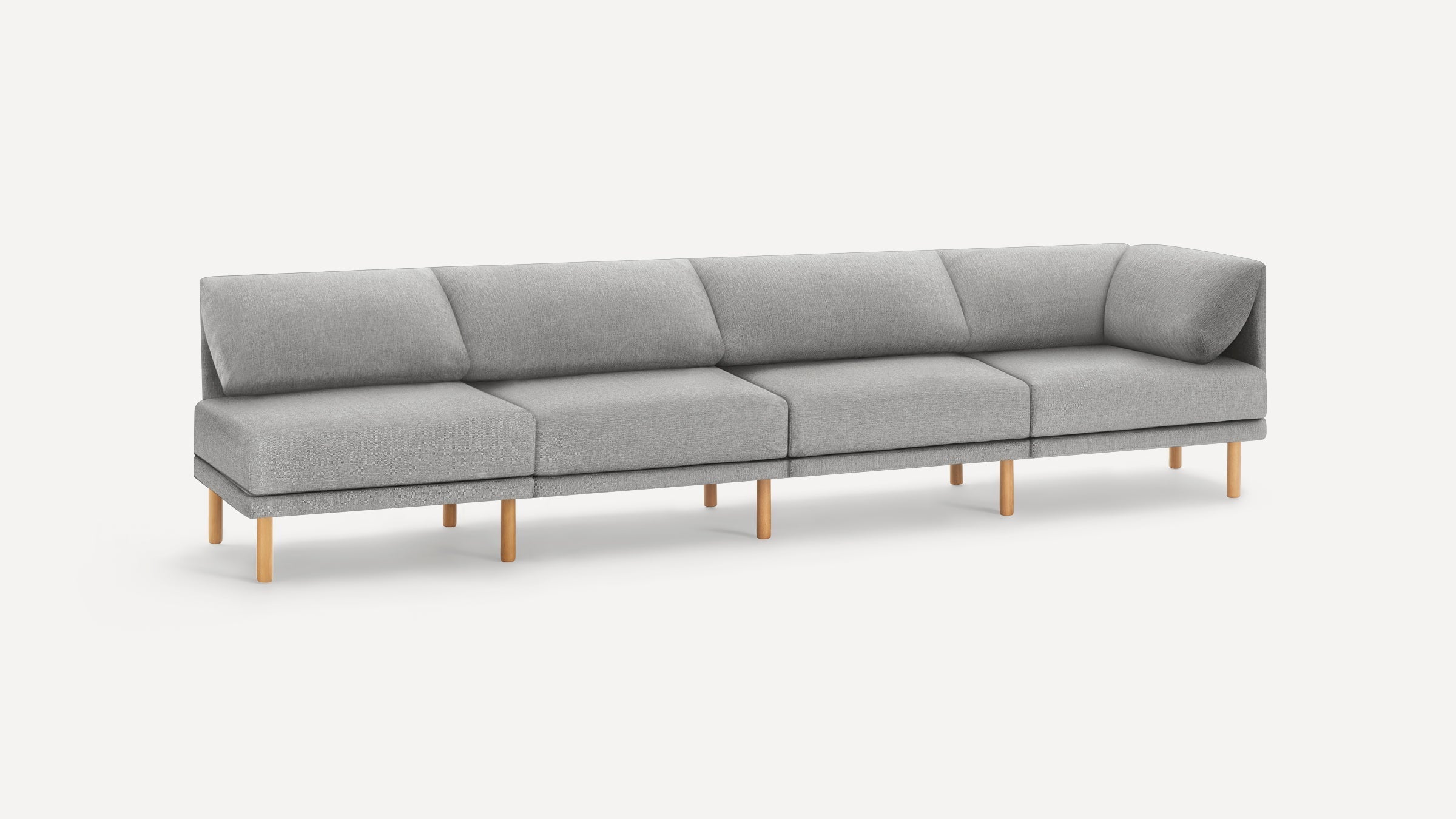 Modern gray fabric sectional sofa with wooden legs, featuring clean lines and angled corner design.