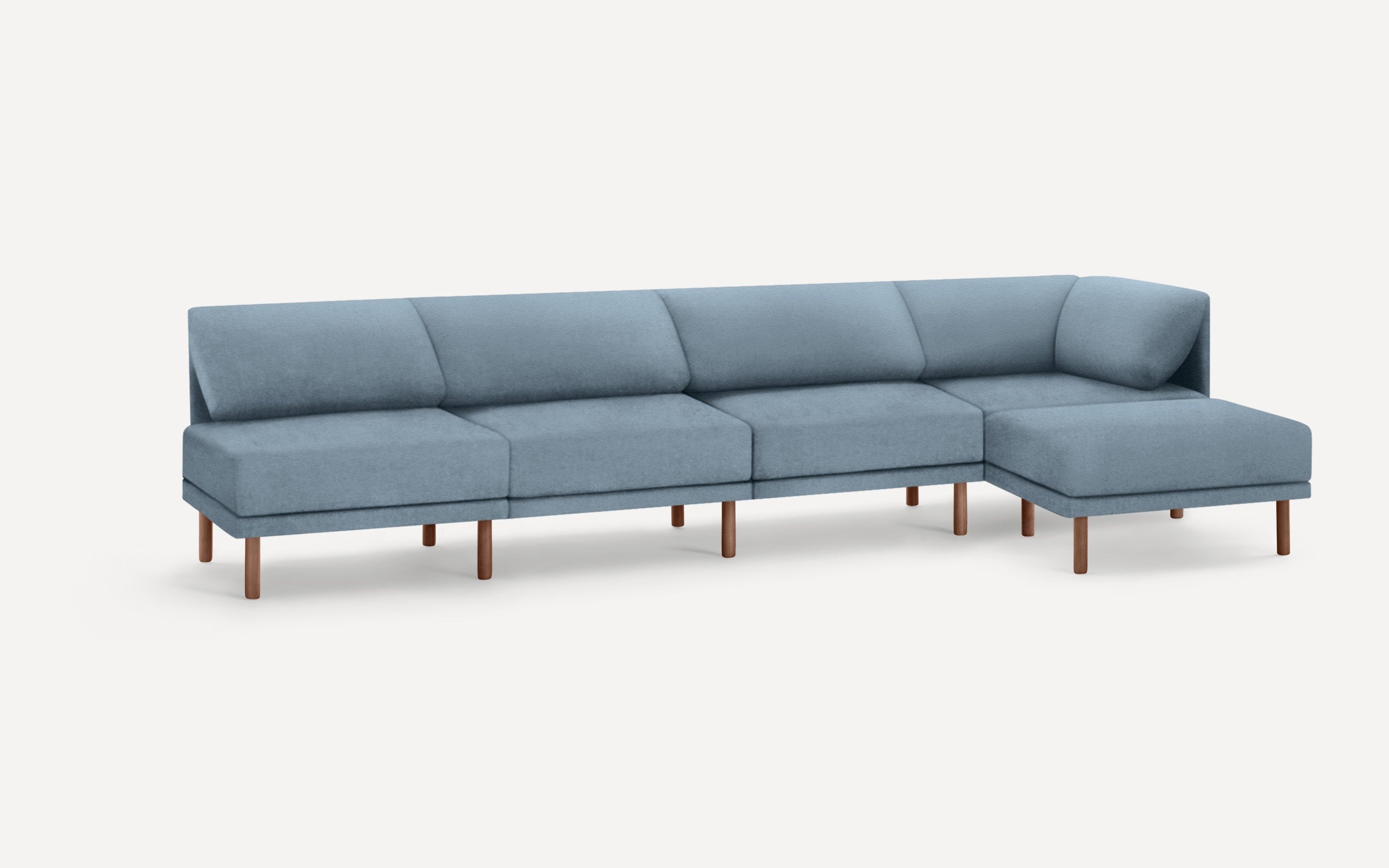 Modern sectional sofa with blue fabric upholstery and wooden legs, featuring a right-hand chaise lounge.