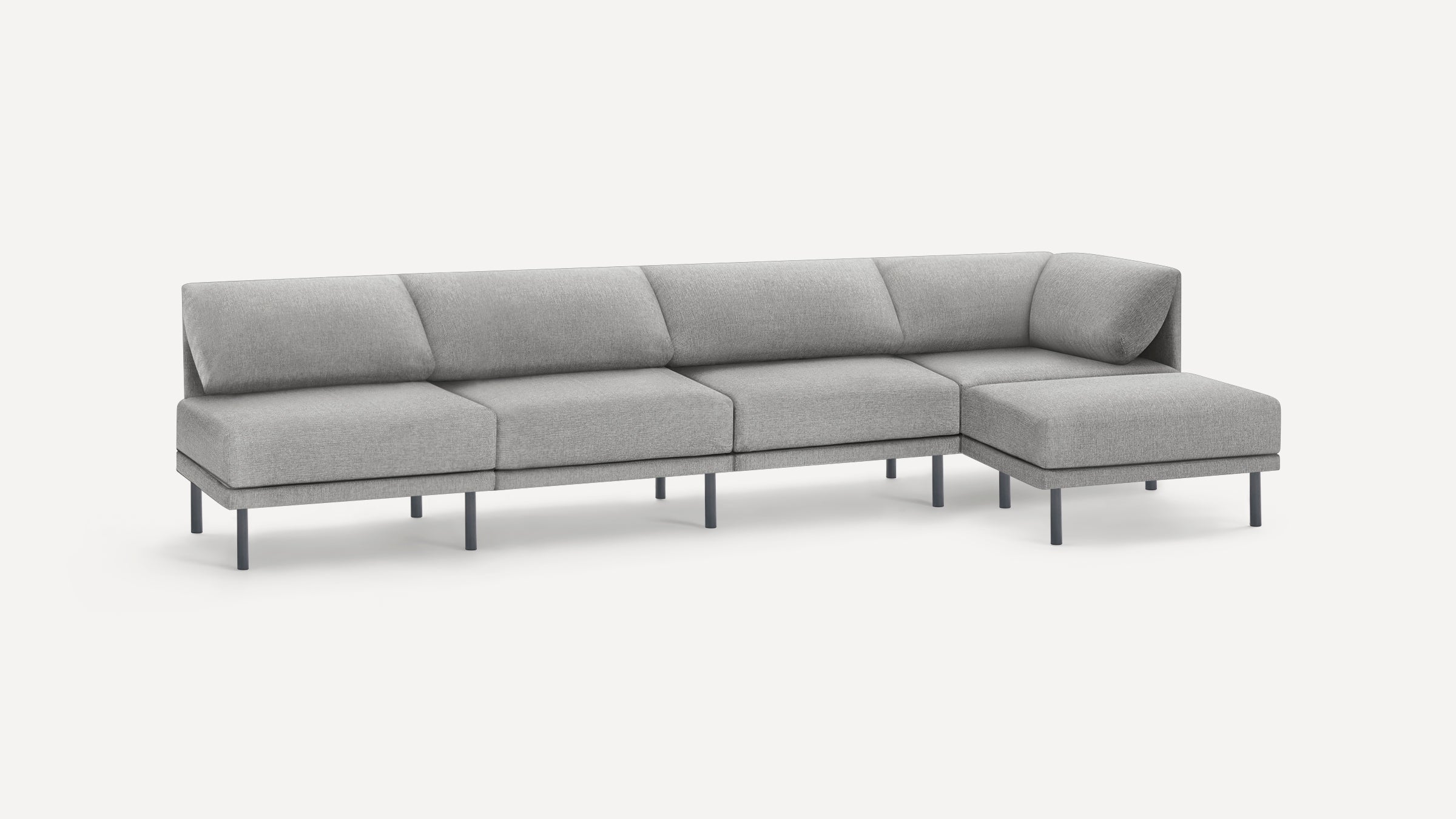 Modern sectional sofa in light gray fabric with metal legs, featuring five seat cushions and a right-side chaise lounge.