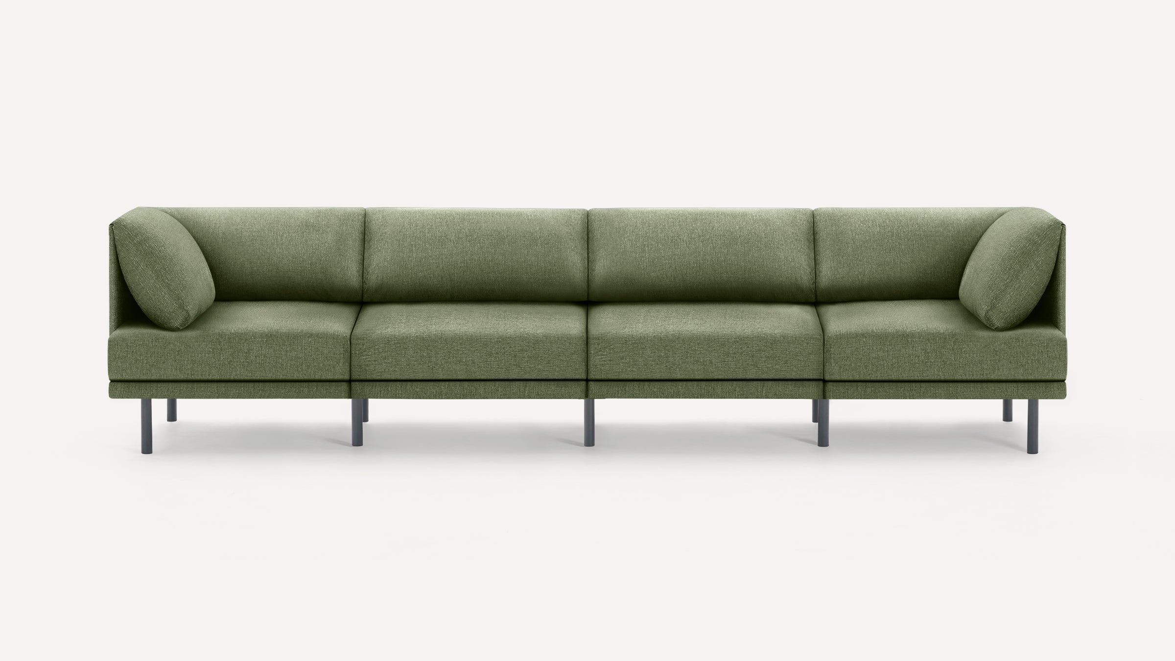 Modern olive green four-seater sofa with clean lines, soft cushions, and slim black legs on a plain white background.