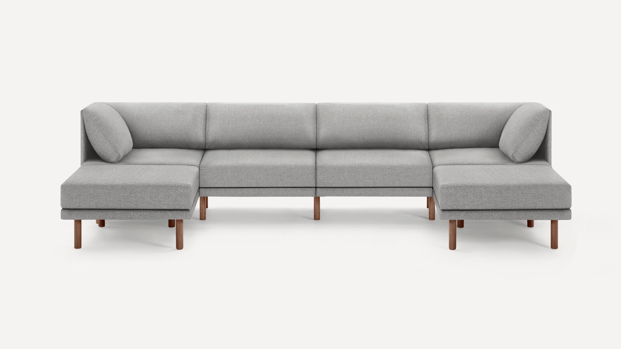 Modern light gray sectional sofa with clean lines, wooden legs, and matching cushions on both ends, shown on a white background.