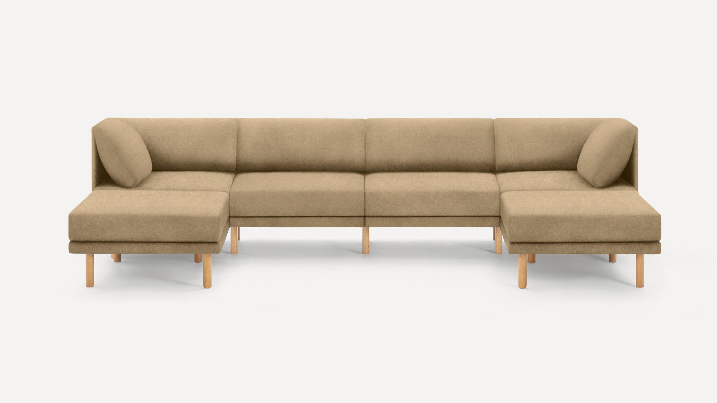 Wide beige sectional sofa with wooden legs, featuring two corner seats with angled back cushions, set against a plain white background.
