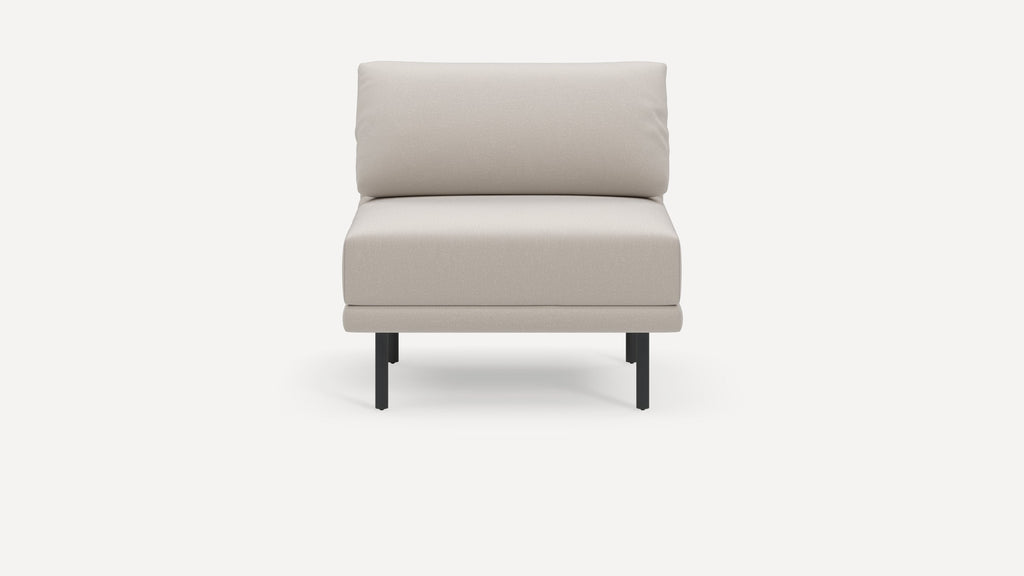 Modern beige armless accent chair with cushioned back and seat, supported by slender black metal legs on white background.