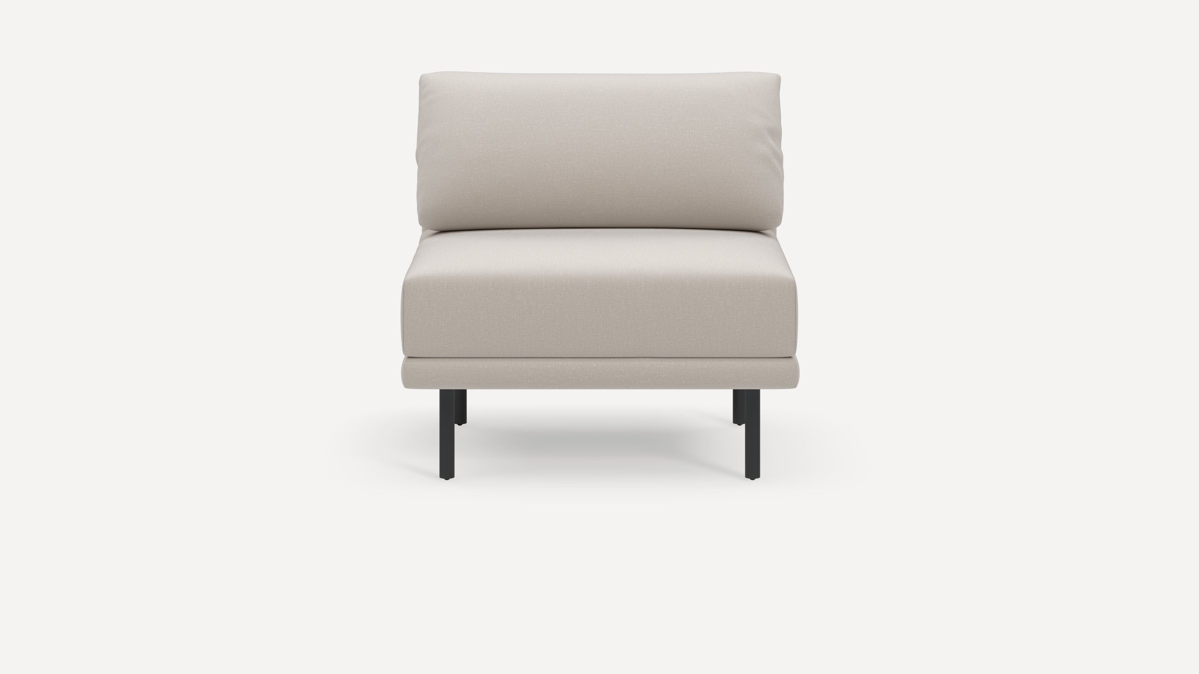 Modern beige armless accent chair with cushioned back and seat, supported by slender black metal legs on white background.