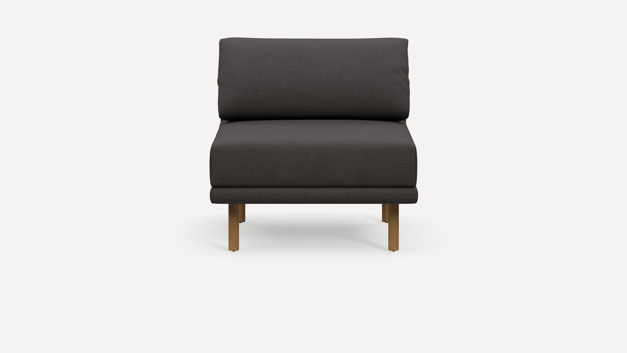 Front view of a modern armless lounge chair with dark gray fabric and wooden legs on a white background.