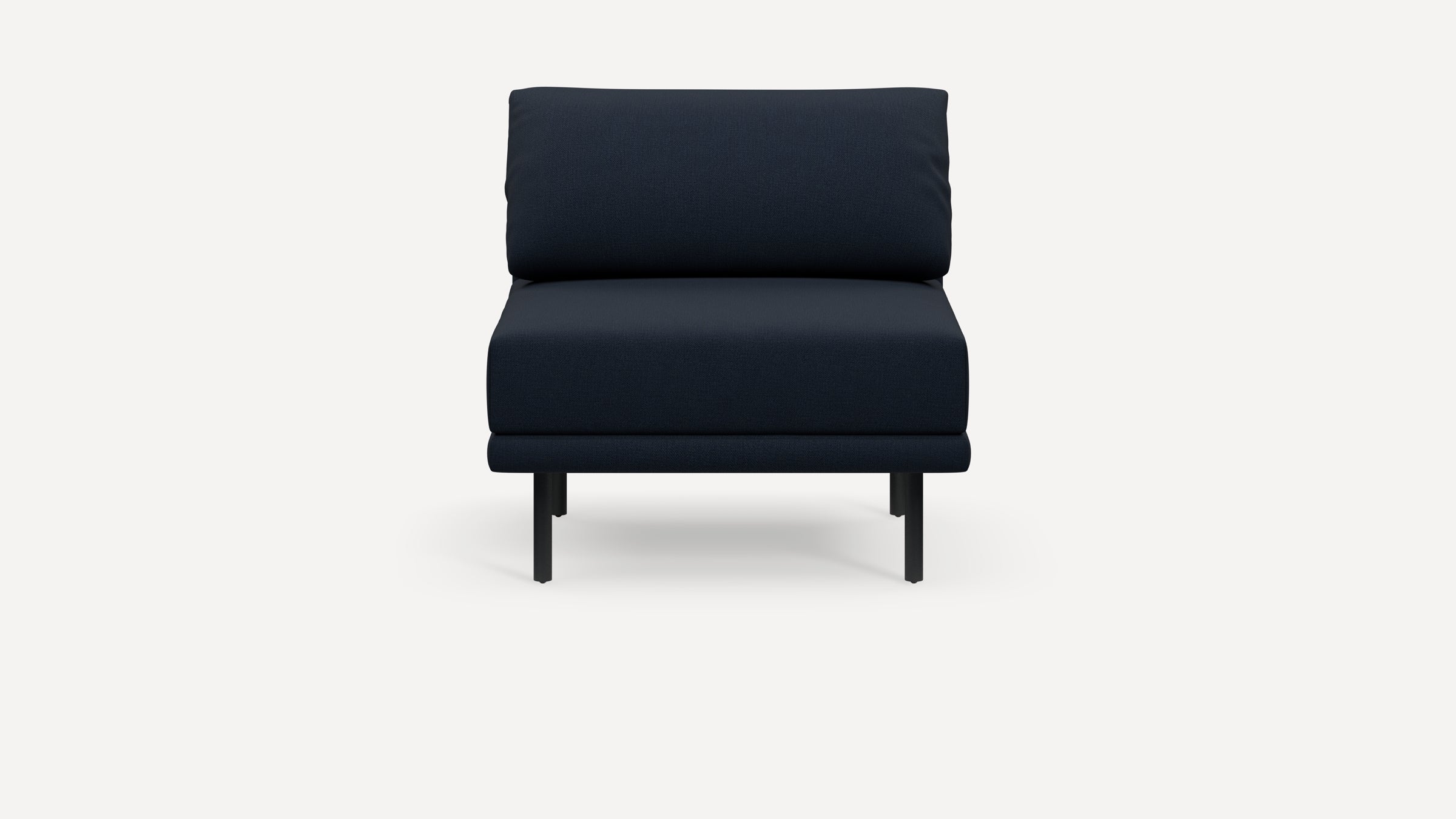 Front view of a modern dark navy blue upholstered armless lounge chair with slim black metal legs on a white background.