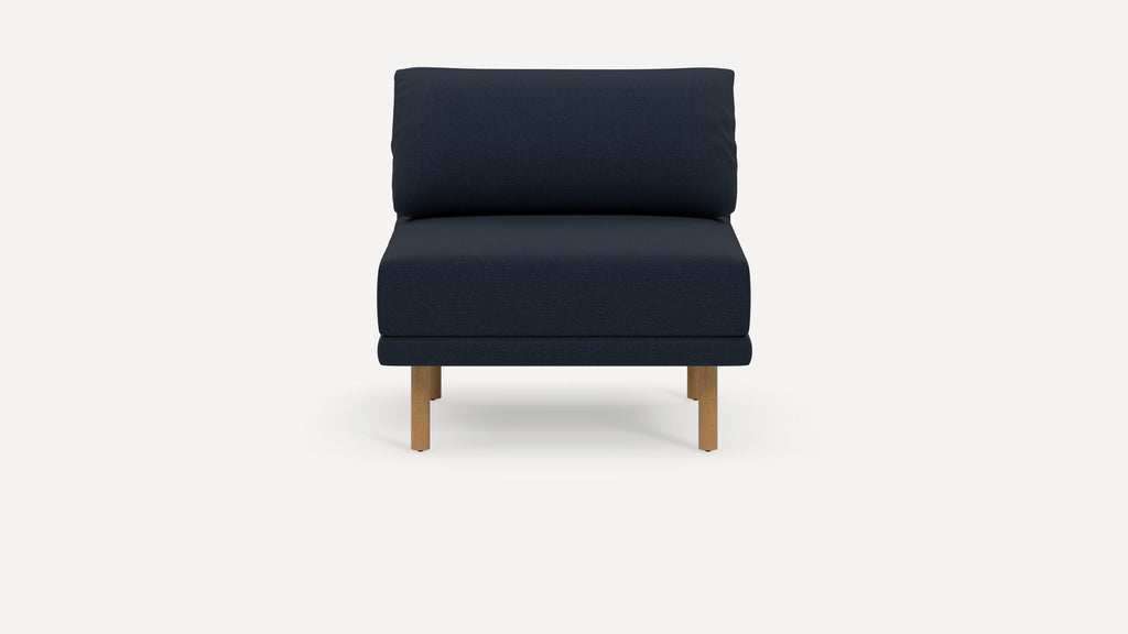 Front view of a modern navy blue armless chair with wooden legs on a plain white background.