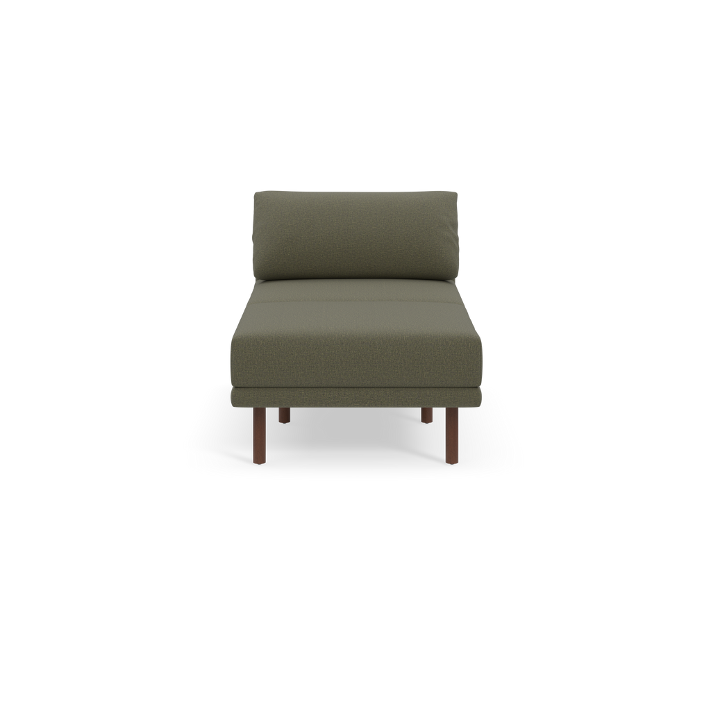 Minimalist Moss green upholstered chaise lounge with wooden legs, featuring a cushioned backrest against a black background.