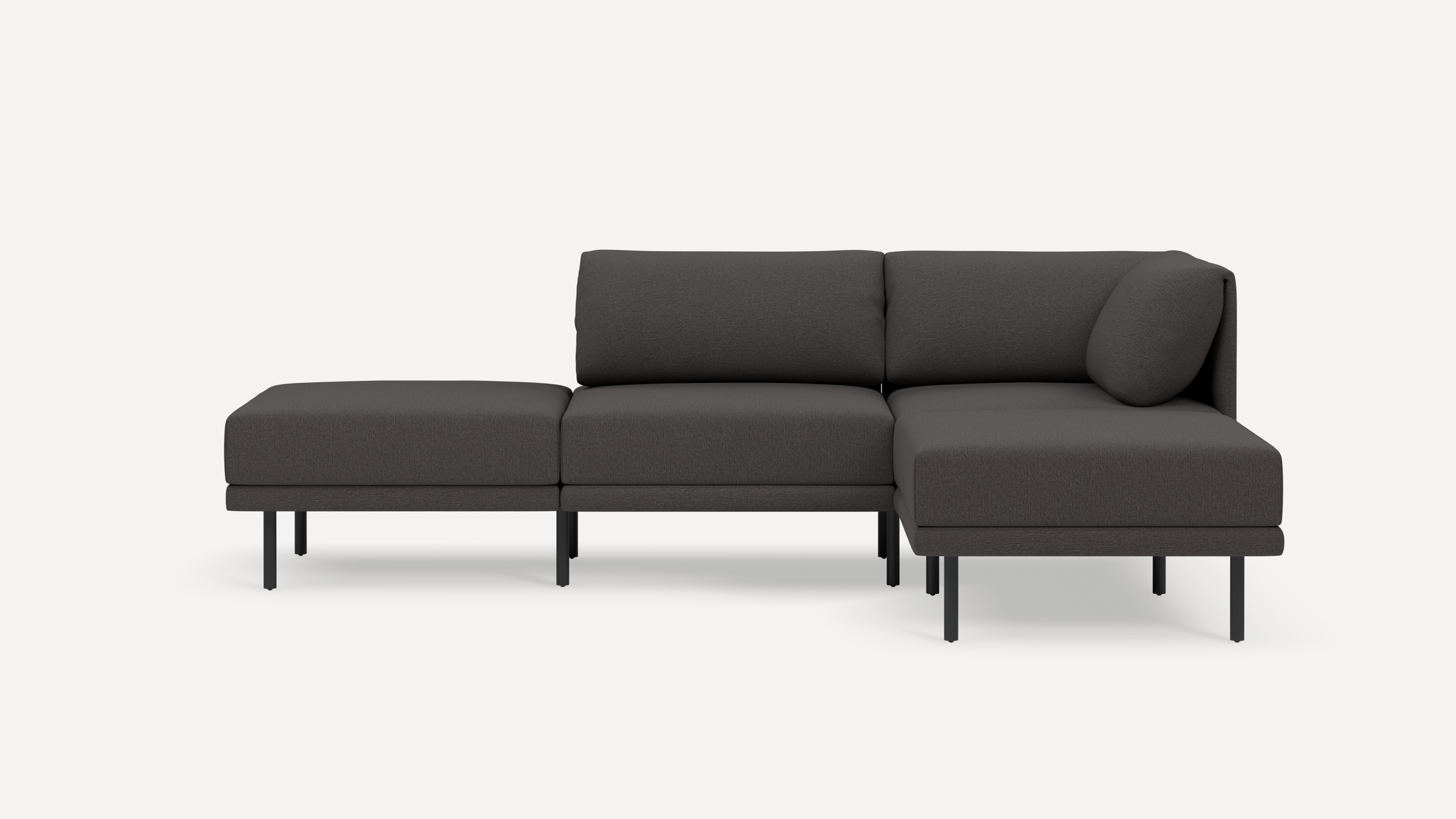 Modern dark gray sectional sofa with metal legs, featuring a left chaise and plush cushions, against a white background.