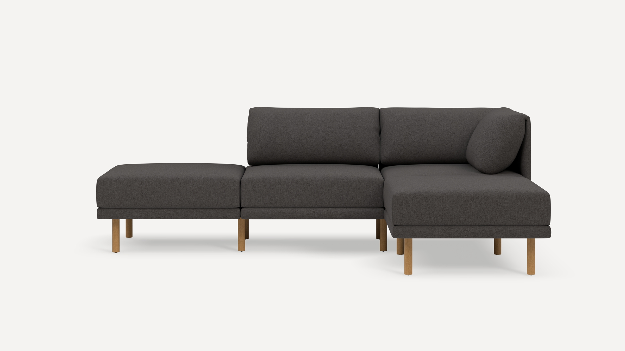 Modern dark gray sectional sofa with wooden legs, featuring three seating sections and cushioned backrests on a white background.