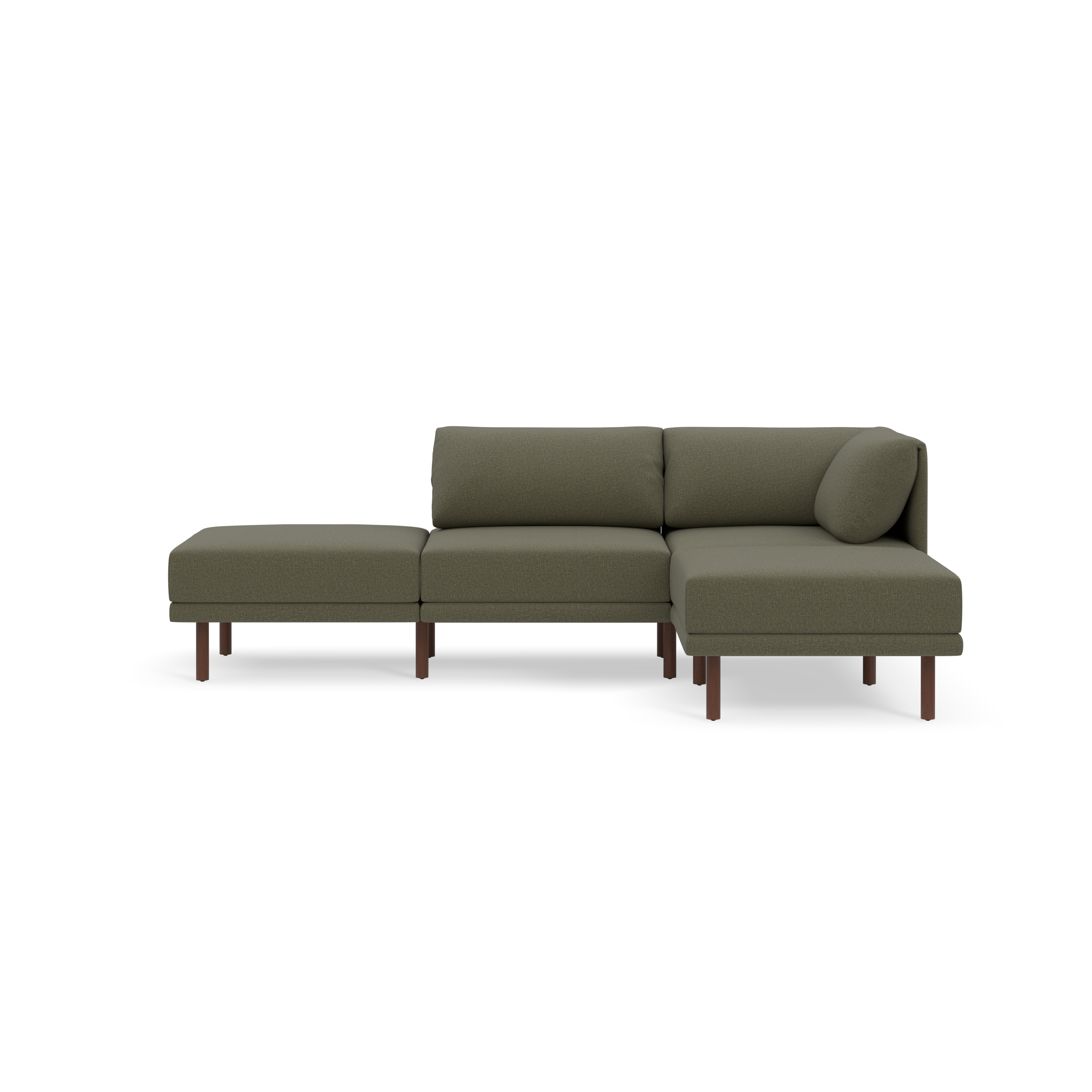 Modern Moss green fabric sectional sofa with wooden legs, featuring a chaise lounge and a round accent pillow, isolated on black background.